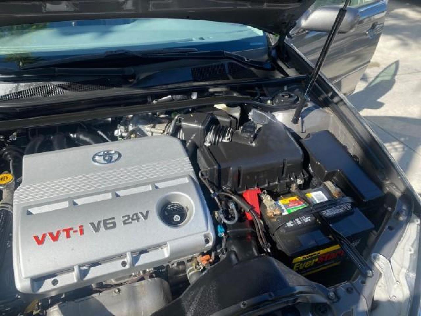 2005 Phantom Gray Pearl /Stone Toyota Camry XLE LOW MILES 68,563 1 OWNER (4T1BF30K05U) with an 3.0L DOHC MPFI Vvti 24-Valve V6 Engine engine, Automatic transmission, located at 4701 North Dixie Hwy, Pompano Beach, FL, 33064, (954) 422-2889, 26.240938, -80.123474 - OUR WEBPAGE FLORIDACARS1.COM HAS OVER 100 PHOTOS AND FREE CARFAX LINK 2005 TOYOTA CAMRY XLE V6 1 OWNER VIN: 4T1BF30K05U621308 4 T 1 B F 3 0 K 0 5 U 6 2 1 3 0 8 SEDAN 4 DR 3.0L V6 F DOHC 24V GASOLINE 28 MPG FRONT WHEEL DRIVE Features ABS Brakes Air Conditioning Alloy Wheels AM/FM Stereo Automatic Tra - Photo#25