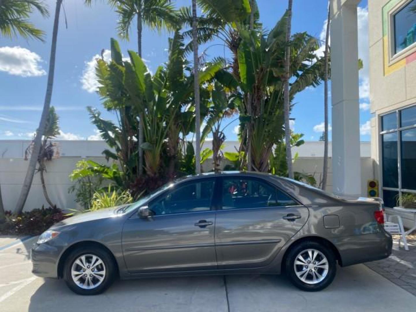 2005 Phantom Gray Pearl /Stone Toyota Camry XLE LOW MILES 68,563 1 OWNER (4T1BF30K05U) with an 3.0L DOHC MPFI Vvti 24-Valve V6 Engine engine, Automatic transmission, located at 4701 North Dixie Hwy, Pompano Beach, FL, 33064, (954) 422-2889, 26.240938, -80.123474 - OUR WEBPAGE FLORIDACARS1.COM HAS OVER 100 PHOTOS AND FREE CARFAX LINK 2005 TOYOTA CAMRY XLE V6 1 OWNER VIN: 4T1BF30K05U621308 4 T 1 B F 3 0 K 0 5 U 6 2 1 3 0 8 SEDAN 4 DR 3.0L V6 F DOHC 24V GASOLINE 28 MPG FRONT WHEEL DRIVE Features ABS Brakes Air Conditioning Alloy Wheels AM/FM Stereo Automatic Tra - Photo#32