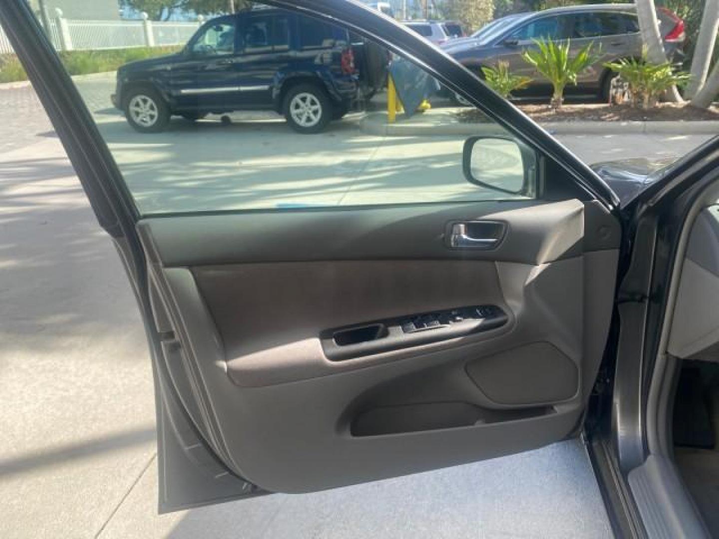 2005 Phantom Gray Pearl /Stone Toyota Camry XLE LOW MILES 68,563 1 OWNER (4T1BF30K05U) with an 3.0L DOHC MPFI Vvti 24-Valve V6 Engine engine, Automatic transmission, located at 4701 North Dixie Hwy, Pompano Beach, FL, 33064, (954) 422-2889, 26.240938, -80.123474 - OUR WEBPAGE FLORIDACARS1.COM HAS OVER 100 PHOTOS AND FREE CARFAX LINK 2005 TOYOTA CAMRY XLE V6 1 OWNER VIN: 4T1BF30K05U621308 4 T 1 B F 3 0 K 0 5 U 6 2 1 3 0 8 SEDAN 4 DR 3.0L V6 F DOHC 24V GASOLINE 28 MPG FRONT WHEEL DRIVE Features ABS Brakes Air Conditioning Alloy Wheels AM/FM Stereo Automatic Tra - Photo#41