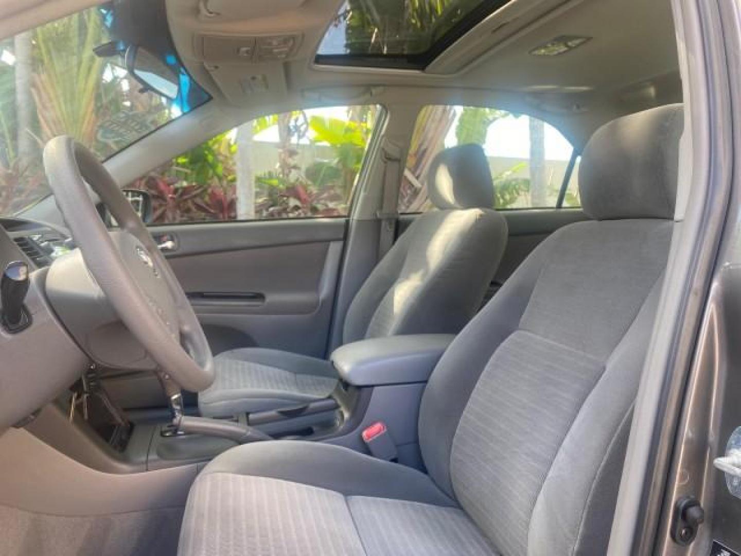 2005 Phantom Gray Pearl /Stone Toyota Camry XLE LOW MILES 68,563 1 OWNER (4T1BF30K05U) with an 3.0L DOHC MPFI Vvti 24-Valve V6 Engine engine, Automatic transmission, located at 4701 North Dixie Hwy, Pompano Beach, FL, 33064, (954) 422-2889, 26.240938, -80.123474 - OUR WEBPAGE FLORIDACARS1.COM HAS OVER 100 PHOTOS AND FREE CARFAX LINK 2005 TOYOTA CAMRY XLE V6 1 OWNER VIN: 4T1BF30K05U621308 4 T 1 B F 3 0 K 0 5 U 6 2 1 3 0 8 SEDAN 4 DR 3.0L V6 F DOHC 24V GASOLINE 28 MPG FRONT WHEEL DRIVE Features ABS Brakes Air Conditioning Alloy Wheels AM/FM Stereo Automatic Tra - Photo#43