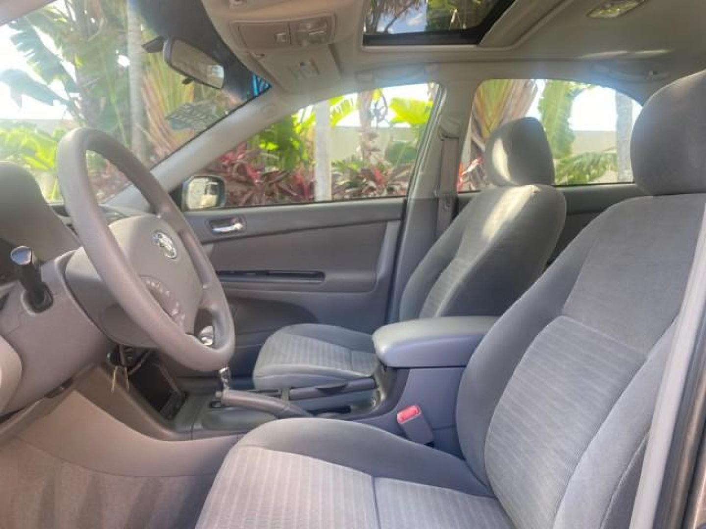 2005 Phantom Gray Pearl /Stone Toyota Camry XLE LOW MILES 68,563 1 OWNER (4T1BF30K05U) with an 3.0L DOHC MPFI Vvti 24-Valve V6 Engine engine, Automatic transmission, located at 4701 North Dixie Hwy, Pompano Beach, FL, 33064, (954) 422-2889, 26.240938, -80.123474 - OUR WEBPAGE FLORIDACARS1.COM HAS OVER 100 PHOTOS AND FREE CARFAX LINK 2005 TOYOTA CAMRY XLE V6 1 OWNER VIN: 4T1BF30K05U621308 4 T 1 B F 3 0 K 0 5 U 6 2 1 3 0 8 SEDAN 4 DR 3.0L V6 F DOHC 24V GASOLINE 28 MPG FRONT WHEEL DRIVE Features ABS Brakes Air Conditioning Alloy Wheels AM/FM Stereo Automatic Tra - Photo#44