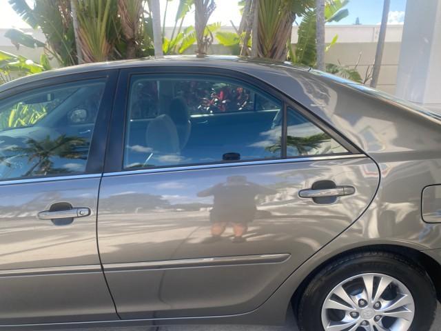 2005 Phantom Gray Pearl /Stone Toyota Camry XLE LOW MILES 68,563 1 OWNER (4T1BF30K05U) with an 3.0L DOHC MPFI Vvti 24-Valve V6 Engine engine, Automatic transmission, located at 4701 North Dixie Hwy, Pompano Beach, FL, 33064, (954) 422-2889, 26.240938, -80.123474 - OUR WEBPAGE FLORIDACARS1.COM HAS OVER 100 PHOTOS AND FREE CARFAX LINK 2005 TOYOTA CAMRY XLE V6 1 OWNER VIN: 4T1BF30K05U621308 4 T 1 B F 3 0 K 0 5 U 6 2 1 3 0 8 SEDAN 4 DR 3.0L V6 F DOHC 24V GASOLINE 28 MPG FRONT WHEEL DRIVE Features ABS Brakes Air Conditioning Alloy Wheels AM/FM Stereo Automatic Tra - Photo#74