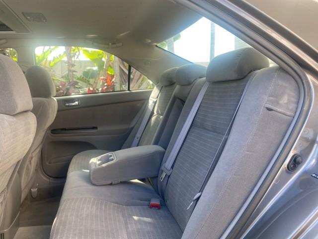 2005 Phantom Gray Pearl /Stone Toyota Camry XLE LOW MILES 68,563 1 OWNER (4T1BF30K05U) with an 3.0L DOHC MPFI Vvti 24-Valve V6 Engine engine, Automatic transmission, located at 4701 North Dixie Hwy, Pompano Beach, FL, 33064, (954) 422-2889, 26.240938, -80.123474 - OUR WEBPAGE FLORIDACARS1.COM HAS OVER 100 PHOTOS AND FREE CARFAX LINK 2005 TOYOTA CAMRY XLE V6 1 OWNER VIN: 4T1BF30K05U621308 4 T 1 B F 3 0 K 0 5 U 6 2 1 3 0 8 SEDAN 4 DR 3.0L V6 F DOHC 24V GASOLINE 28 MPG FRONT WHEEL DRIVE Features ABS Brakes Air Conditioning Alloy Wheels AM/FM Stereo Automatic Tra - Photo#77