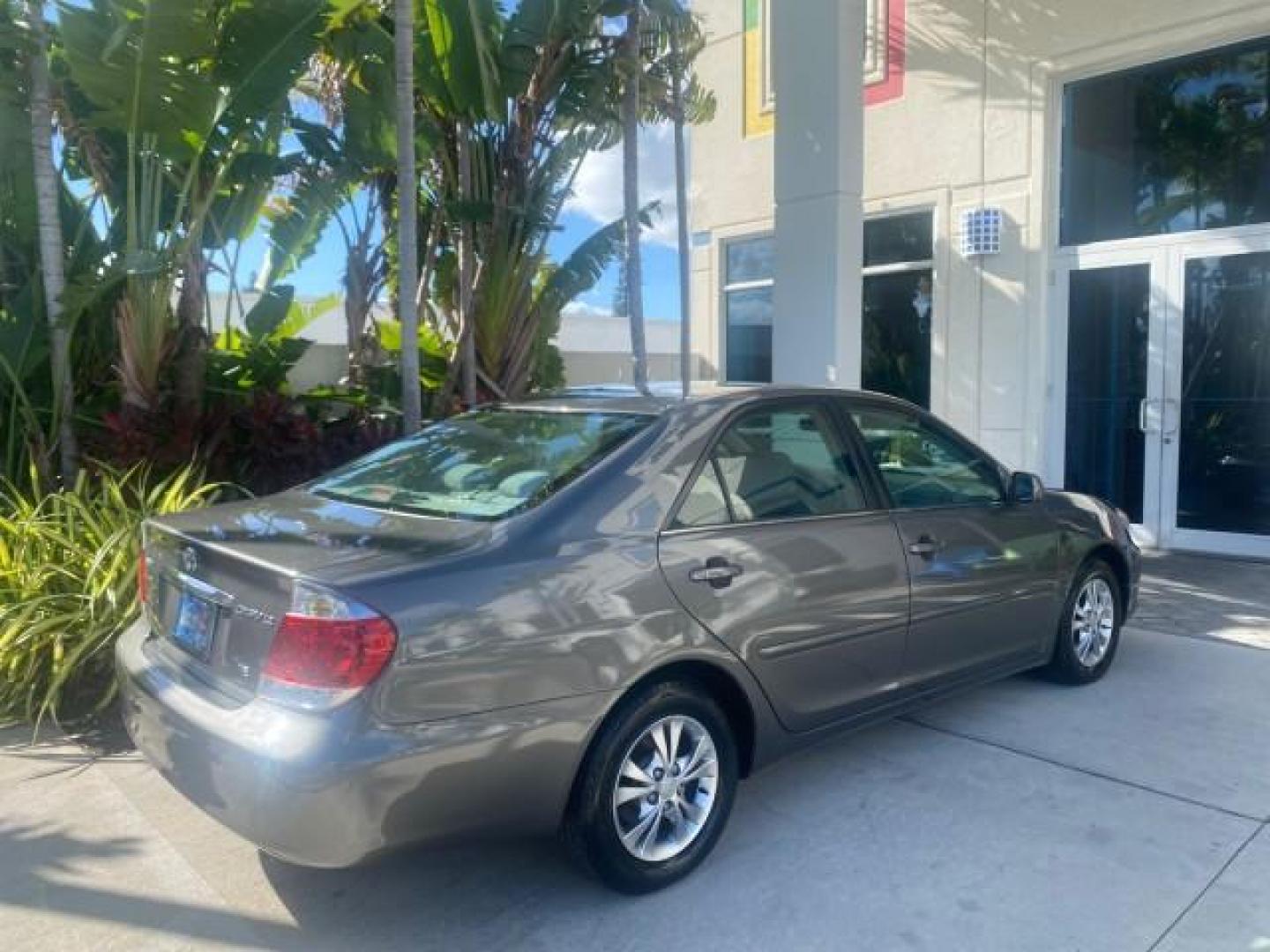 2005 Phantom Gray Pearl /Stone Toyota Camry XLE LOW MILES 68,563 1 OWNER (4T1BF30K05U) with an 3.0L DOHC MPFI Vvti 24-Valve V6 Engine engine, Automatic transmission, located at 4701 North Dixie Hwy, Pompano Beach, FL, 33064, (954) 422-2889, 26.240938, -80.123474 - OUR WEBPAGE FLORIDACARS1.COM HAS OVER 100 PHOTOS AND FREE CARFAX LINK 2005 TOYOTA CAMRY XLE V6 1 OWNER VIN: 4T1BF30K05U621308 4 T 1 B F 3 0 K 0 5 U 6 2 1 3 0 8 SEDAN 4 DR 3.0L V6 F DOHC 24V GASOLINE 28 MPG FRONT WHEEL DRIVE Features ABS Brakes Air Conditioning Alloy Wheels AM/FM Stereo Automatic Tra - Photo#99