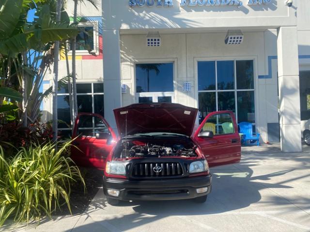 2004 Radiant Red /Charcoal Toyota Tacoma 1 OWNER AUTO AC LIKE NEW (5TENL42N54Z) with an 2.4L DOHC EFI 16-Valve I4 Engine engine, Automatic transmission, located at 4701 North Dixie Hwy, Pompano Beach, FL, 33064, (954) 422-2889, 26.240938, -80.123474 - OUR WEBPAGE FLORIDACARS1.COM HAS OVER 100 PHOTOS AND FREE CARFAX LINK 2004 TOYOTA TACOMA VIN: 5TENL42N54Z414927 5 T E N L 4 2 N 5 4 Z 4 1 4 9 2 7 PICKUP 2.4L I4 F DOHC 16V GASOLINE 29 MPG REAR WHEEL DRIVE Features ABS Brakes Air Conditioning AM/FM Stereo Automatic Transmission Bed Liner Cassette Pla - Photo#16