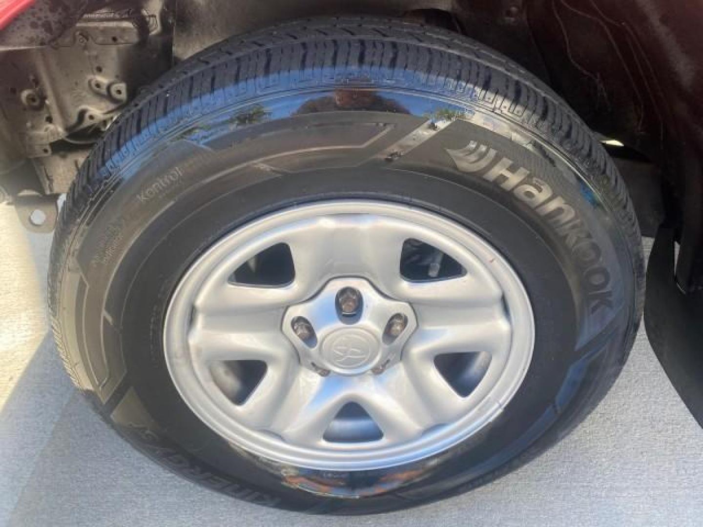 2004 Radiant Red /Charcoal Toyota Tacoma 1 OWNER AUTO AC LIKE NEW (5TENL42N54Z) with an 2.4L DOHC EFI 16-Valve I4 Engine engine, Automatic transmission, located at 4701 North Dixie Hwy, Pompano Beach, FL, 33064, (954) 422-2889, 26.240938, -80.123474 - OUR WEBPAGE FLORIDACARS1.COM HAS OVER 100 PHOTOS AND FREE CARFAX LINK 2004 TOYOTA TACOMA VIN: 5TENL42N54Z414927 5 T E N L 4 2 N 5 4 Z 4 1 4 9 2 7 PICKUP 2.4L I4 F DOHC 16V GASOLINE 29 MPG REAR WHEEL DRIVE Features ABS Brakes Air Conditioning AM/FM Stereo Automatic Transmission Bed Liner Cassette Pla - Photo#19