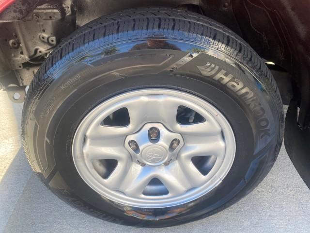 2004 Radiant Red /Charcoal Toyota Tacoma 1 OWNER AUTO AC LIKE NEW (5TENL42N54Z) with an 2.4L DOHC EFI 16-Valve I4 Engine engine, Automatic transmission, located at 4701 North Dixie Hwy, Pompano Beach, FL, 33064, (954) 422-2889, 26.240938, -80.123474 - OUR WEBPAGE FLORIDACARS1.COM HAS OVER 100 PHOTOS AND FREE CARFAX LINK 2004 TOYOTA TACOMA VIN: 5TENL42N54Z414927 5 T E N L 4 2 N 5 4 Z 4 1 4 9 2 7 PICKUP 2.4L I4 F DOHC 16V GASOLINE 29 MPG REAR WHEEL DRIVE Features ABS Brakes Air Conditioning AM/FM Stereo Automatic Transmission Bed Liner Cassette Pla - Photo#19