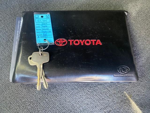 2004 Radiant Red /Charcoal Toyota Tacoma 1 OWNER AUTO AC LIKE NEW (5TENL42N54Z) with an 2.4L DOHC EFI 16-Valve I4 Engine engine, Automatic transmission, located at 4701 North Dixie Hwy, Pompano Beach, FL, 33064, (954) 422-2889, 26.240938, -80.123474 - OUR WEBPAGE FLORIDACARS1.COM HAS OVER 100 PHOTOS AND FREE CARFAX LINK 2004 TOYOTA TACOMA VIN: 5TENL42N54Z414927 5 T E N L 4 2 N 5 4 Z 4 1 4 9 2 7 PICKUP 2.4L I4 F DOHC 16V GASOLINE 29 MPG REAR WHEEL DRIVE Features ABS Brakes Air Conditioning AM/FM Stereo Automatic Transmission Bed Liner Cassette Pla - Photo#23