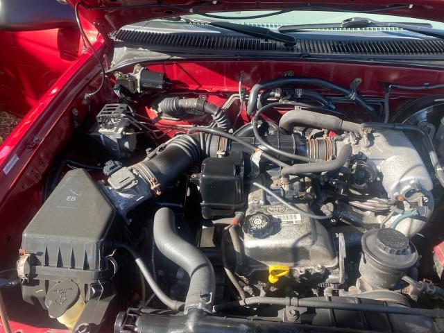 2004 Radiant Red /Charcoal Toyota Tacoma 1 OWNER AUTO AC LIKE NEW (5TENL42N54Z) with an 2.4L DOHC EFI 16-Valve I4 Engine engine, Automatic transmission, located at 4701 North Dixie Hwy, Pompano Beach, FL, 33064, (954) 422-2889, 26.240938, -80.123474 - OUR WEBPAGE FLORIDACARS1.COM HAS OVER 100 PHOTOS AND FREE CARFAX LINK 2004 TOYOTA TACOMA VIN: 5TENL42N54Z414927 5 T E N L 4 2 N 5 4 Z 4 1 4 9 2 7 PICKUP 2.4L I4 F DOHC 16V GASOLINE 29 MPG REAR WHEEL DRIVE Features ABS Brakes Air Conditioning AM/FM Stereo Automatic Transmission Bed Liner Cassette Pla - Photo#24