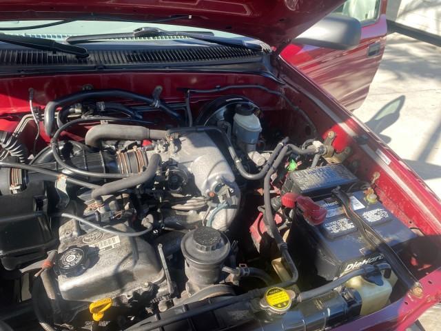 2004 Radiant Red /Charcoal Toyota Tacoma 1 OWNER AUTO AC LIKE NEW (5TENL42N54Z) with an 2.4L DOHC EFI 16-Valve I4 Engine engine, Automatic transmission, located at 4701 North Dixie Hwy, Pompano Beach, FL, 33064, (954) 422-2889, 26.240938, -80.123474 - OUR WEBPAGE FLORIDACARS1.COM HAS OVER 100 PHOTOS AND FREE CARFAX LINK 2004 TOYOTA TACOMA VIN: 5TENL42N54Z414927 5 T E N L 4 2 N 5 4 Z 4 1 4 9 2 7 PICKUP 2.4L I4 F DOHC 16V GASOLINE 29 MPG REAR WHEEL DRIVE Features ABS Brakes Air Conditioning AM/FM Stereo Automatic Transmission Bed Liner Cassette Pla - Photo#25