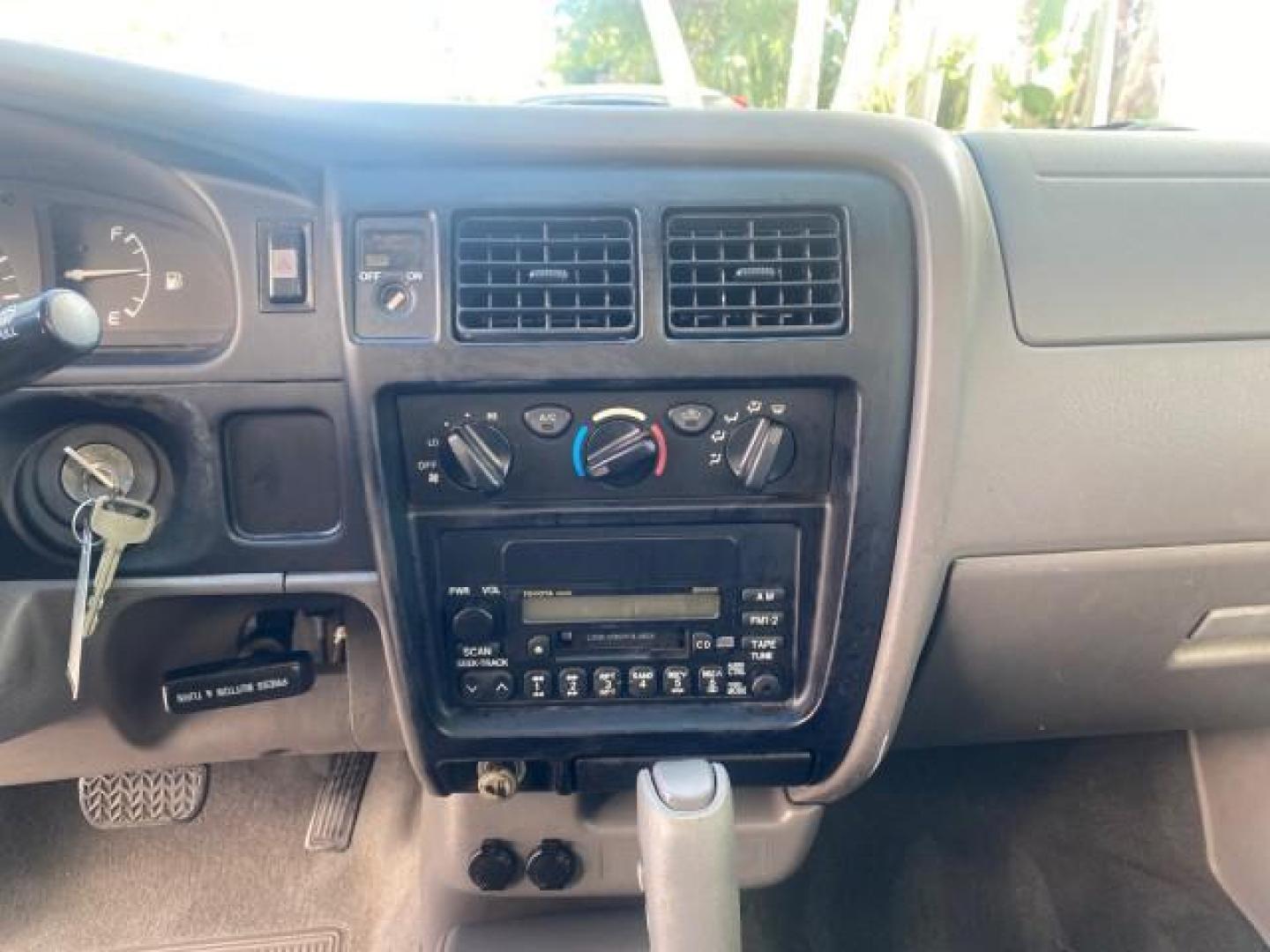 2004 Radiant Red /Charcoal Toyota Tacoma 1 OWNER AUTO AC LIKE NEW (5TENL42N54Z) with an 2.4L DOHC EFI 16-Valve I4 Engine engine, Automatic transmission, located at 4701 North Dixie Hwy, Pompano Beach, FL, 33064, (954) 422-2889, 26.240938, -80.123474 - OUR WEBPAGE FLORIDACARS1.COM HAS OVER 100 PHOTOS AND FREE CARFAX LINK 2004 TOYOTA TACOMA VIN: 5TENL42N54Z414927 5 T E N L 4 2 N 5 4 Z 4 1 4 9 2 7 PICKUP 2.4L I4 F DOHC 16V GASOLINE 29 MPG REAR WHEEL DRIVE Features ABS Brakes Air Conditioning AM/FM Stereo Automatic Transmission Bed Liner Cassette Pla - Photo#52
