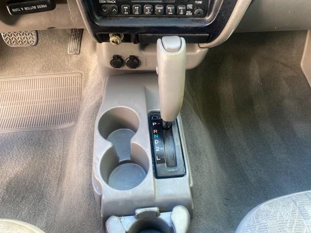 2004 Radiant Red /Charcoal Toyota Tacoma 1 OWNER AUTO AC LIKE NEW (5TENL42N54Z) with an 2.4L DOHC EFI 16-Valve I4 Engine engine, Automatic transmission, located at 4701 North Dixie Hwy, Pompano Beach, FL, 33064, (954) 422-2889, 26.240938, -80.123474 - OUR WEBPAGE FLORIDACARS1.COM HAS OVER 100 PHOTOS AND FREE CARFAX LINK 2004 TOYOTA TACOMA VIN: 5TENL42N54Z414927 5 T E N L 4 2 N 5 4 Z 4 1 4 9 2 7 PICKUP 2.4L I4 F DOHC 16V GASOLINE 29 MPG REAR WHEEL DRIVE Features ABS Brakes Air Conditioning AM/FM Stereo Automatic Transmission Bed Liner Cassette Pla - Photo#54