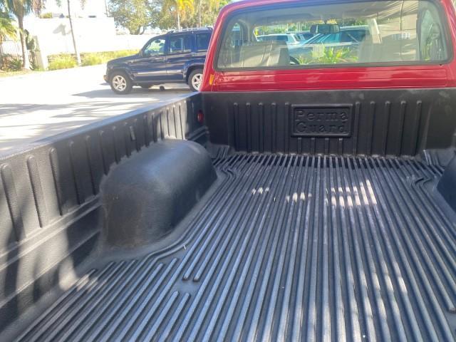 2004 Radiant Red /Charcoal Toyota Tacoma 1 OWNER AUTO AC LIKE NEW (5TENL42N54Z) with an 2.4L DOHC EFI 16-Valve I4 Engine engine, Automatic transmission, located at 4701 North Dixie Hwy, Pompano Beach, FL, 33064, (954) 422-2889, 26.240938, -80.123474 - OUR WEBPAGE FLORIDACARS1.COM HAS OVER 100 PHOTOS AND FREE CARFAX LINK 2004 TOYOTA TACOMA VIN: 5TENL42N54Z414927 5 T E N L 4 2 N 5 4 Z 4 1 4 9 2 7 PICKUP 2.4L I4 F DOHC 16V GASOLINE 29 MPG REAR WHEEL DRIVE Features ABS Brakes Air Conditioning AM/FM Stereo Automatic Transmission Bed Liner Cassette Pla - Photo#80
