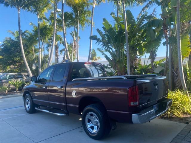 2005 Deep Molten Red Pearl /Dark Slate Gray Dodge Ram 1500 SLT 1 OWNER FL HEMI 5.7 V8 (1D7HA18D25J) with an 5.7L V8 Hemi Magnum Engine engine, Automatic transmission, located at 4701 North Dixie Hwy, Pompano Beach, FL, 33064, (954) 422-2889, 26.240938, -80.123474 - OUR WEBPAGE FLORIDACARS1.COM HAS OVER 100 PHOTOS AND FREE CARFAX LINK 2005 DODGE RAM 1500 SLT 5.7 V8 HEMI CREW CAB 1 OWNER FLORIDA VIN: 1D7HA18D25J621258 1 D 7 H A 1 8 D 2 5 J 6 2 1 2 5 8 4 DOOR EXTENDED CAB PICKUP 5.7L V8 F GASOLINE 18 MPG REAR WHEEL DRIVE Features ABS Brakes Air Conditioning AM/FM - Photo#5