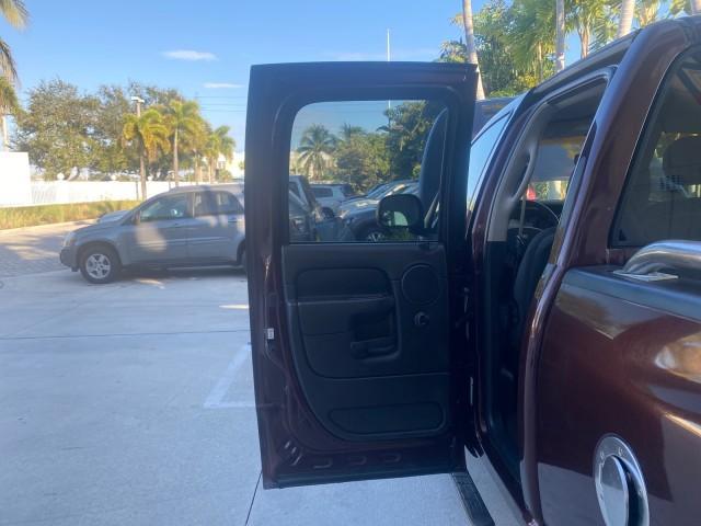 2005 Deep Molten Red Pearl /Dark Slate Gray Dodge Ram 1500 SLT 1 OWNER FL HEMI 5.7 V8 (1D7HA18D25J) with an 5.7L V8 Hemi Magnum Engine engine, Automatic transmission, located at 4701 North Dixie Hwy, Pompano Beach, FL, 33064, (954) 422-2889, 26.240938, -80.123474 - OUR WEBPAGE FLORIDACARS1.COM HAS OVER 100 PHOTOS AND FREE CARFAX LINK 2005 DODGE RAM 1500 SLT 5.7 V8 HEMI CREW CAB 1 OWNER FLORIDA VIN: 1D7HA18D25J621258 1 D 7 H A 1 8 D 2 5 J 6 2 1 2 5 8 4 DOOR EXTENDED CAB PICKUP 5.7L V8 F GASOLINE 18 MPG REAR WHEEL DRIVE Features ABS Brakes Air Conditioning AM/FM - Photo#13