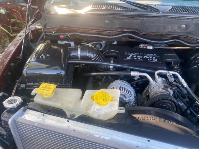 2005 Deep Molten Red Pearl /Dark Slate Gray Dodge Ram 1500 SLT 1 OWNER FL HEMI 5.7 V8 (1D7HA18D25J) with an 5.7L V8 Hemi Magnum Engine engine, Automatic transmission, located at 4701 North Dixie Hwy, Pompano Beach, FL, 33064, (954) 422-2889, 26.240938, -80.123474 - OUR WEBPAGE FLORIDACARS1.COM HAS OVER 100 PHOTOS AND FREE CARFAX LINK 2005 DODGE RAM 1500 SLT 5.7 V8 HEMI CREW CAB 1 OWNER FLORIDA VIN: 1D7HA18D25J621258 1 D 7 H A 1 8 D 2 5 J 6 2 1 2 5 8 4 DOOR EXTENDED CAB PICKUP 5.7L V8 F GASOLINE 18 MPG REAR WHEEL DRIVE Features ABS Brakes Air Conditioning AM/FM - Photo#24