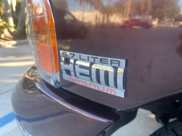 2005 Deep Molten Red Pearl /Dark Slate Gray Dodge Ram 1500 SLT 1 OWNER FL HEMI 5.7 V8 (1D7HA18D25J) with an 5.7L V8 Hemi Magnum Engine engine, Automatic transmission, located at 4701 North Dixie Hwy, Pompano Beach, FL, 33064, (954) 422-2889, 26.240938, -80.123474 - OUR WEBPAGE FLORIDACARS1.COM HAS OVER 100 PHOTOS AND FREE CARFAX LINK 2005 DODGE RAM 1500 SLT 5.7 V8 HEMI CREW CAB 1 OWNER FLORIDA VIN: 1D7HA18D25J621258 1 D 7 H A 1 8 D 2 5 J 6 2 1 2 5 8 4 DOOR EXTENDED CAB PICKUP 5.7L V8 F GASOLINE 18 MPG REAR WHEEL DRIVE Features ABS Brakes Air Conditioning AM/FM - Photo#40