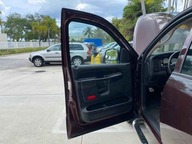 2005 Deep Molten Red Pearl /Dark Slate Gray Dodge Ram 1500 4 DR SLT 1 OWNER FL HEMI 5.7 V8 (1D7HA18D25J) with an 5.7L V8 Hemi Magnum Engine engine, Automatic transmission, located at 4701 North Dixie Hwy, Pompano Beach, FL, 33064, (954) 422-2889, 26.240938, -80.123474 - OUR WEBPAGE FLORIDACARS1.COM HAS OVER 100 PHOTOS AND FREE CARFAX LINK 2005 DODGE RAM 1500 SLT 5.7 V8 HEMI EXTENDED CAB 1 OWNER FLORIDA VIN: 1D7HA18D25J621258 1 D 7 H A 1 8 D 2 5 J 6 2 1 2 5 8 4 DOOR EXTENDED CAB PICKUP 5.7L V8 F GASOLINE 18 MPG REAR WHEEL DRIVE Features ABS Brakes Air Conditioning A - Photo#9