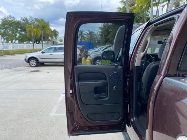 2005 Deep Molten Red Pearl /Dark Slate Gray Dodge Ram 1500 4 DR SLT 1 OWNER FL HEMI 5.7 V8 (1D7HA18D25J) with an 5.7L V8 Hemi Magnum Engine engine, Automatic transmission, located at 4701 North Dixie Hwy, Pompano Beach, FL, 33064, (954) 422-2889, 26.240938, -80.123474 - OUR WEBPAGE FLORIDACARS1.COM HAS OVER 100 PHOTOS AND FREE CARFAX LINK 2005 DODGE RAM 1500 SLT 5.7 V8 HEMI EXTENDED CAB 1 OWNER FLORIDA VIN: 1D7HA18D25J621258 1 D 7 H A 1 8 D 2 5 J 6 2 1 2 5 8 4 DOOR EXTENDED CAB PICKUP 5.7L V8 F GASOLINE 18 MPG REAR WHEEL DRIVE Features ABS Brakes Air Conditioning A - Photo#13
