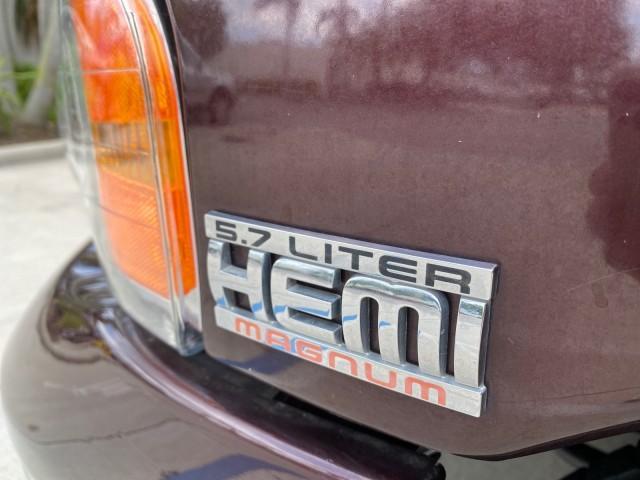 2005 Deep Molten Red Pearl /Dark Slate Gray Dodge Ram 1500 4 DR SLT 1 OWNER FL HEMI 5.7 V8 (1D7HA18D25J) with an 5.7L V8 Hemi Magnum Engine engine, Automatic transmission, located at 4701 North Dixie Hwy, Pompano Beach, FL, 33064, (954) 422-2889, 26.240938, -80.123474 - OUR WEBPAGE FLORIDACARS1.COM HAS OVER 100 PHOTOS AND FREE CARFAX LINK 2005 DODGE RAM 1500 SLT 5.7 V8 HEMI EXTENDED CAB 1 OWNER FLORIDA VIN: 1D7HA18D25J621258 1 D 7 H A 1 8 D 2 5 J 6 2 1 2 5 8 4 DOOR EXTENDED CAB PICKUP 5.7L V8 F GASOLINE 18 MPG REAR WHEEL DRIVE Features ABS Brakes Air Conditioning A - Photo#42