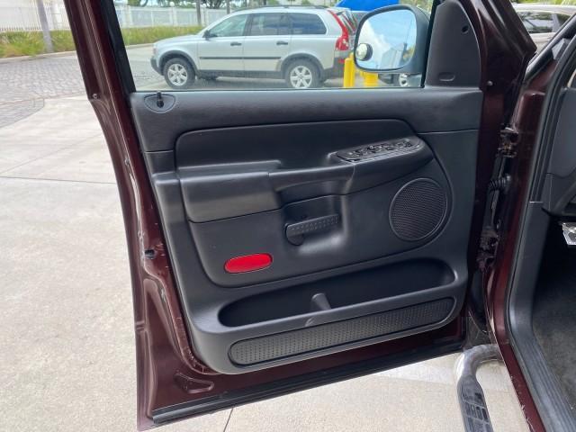 2005 Deep Molten Red Pearl /Dark Slate Gray Dodge Ram 1500 4 DR SLT 1 OWNER FL HEMI 5.7 V8 (1D7HA18D25J) with an 5.7L V8 Hemi Magnum Engine engine, Automatic transmission, located at 4701 North Dixie Hwy, Pompano Beach, FL, 33064, (954) 422-2889, 26.240938, -80.123474 - OUR WEBPAGE FLORIDACARS1.COM HAS OVER 100 PHOTOS AND FREE CARFAX LINK 2005 DODGE RAM 1500 SLT 5.7 V8 HEMI EXTENDED CAB 1 OWNER FLORIDA VIN: 1D7HA18D25J621258 1 D 7 H A 1 8 D 2 5 J 6 2 1 2 5 8 4 DOOR EXTENDED CAB PICKUP 5.7L V8 F GASOLINE 18 MPG REAR WHEEL DRIVE Features ABS Brakes Air Conditioning A - Photo#43