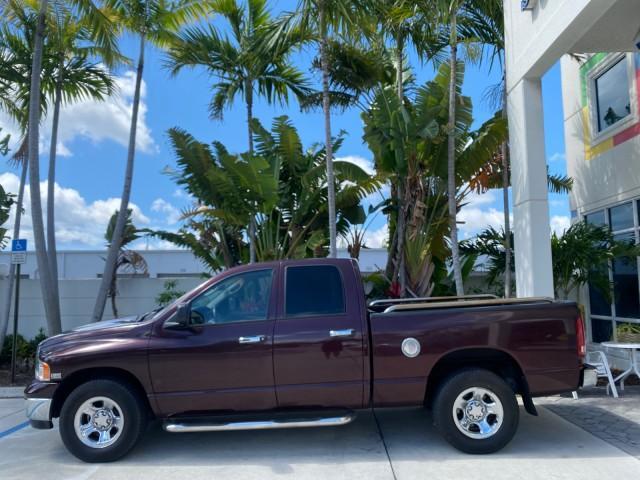 2005 Deep Molten Red Pearl /Dark Slate Gray Dodge Ram 1500 4 DR SLT 1 OWNER FL HEMI 5.7 V8 (1D7HA18D25J) with an 5.7L V8 Hemi Magnum Engine engine, Automatic transmission, located at 4701 North Dixie Hwy, Pompano Beach, FL, 33064, (954) 422-2889, 26.240938, -80.123474 - OUR WEBPAGE FLORIDACARS1.COM HAS OVER 100 PHOTOS AND FREE CARFAX LINK 2005 DODGE RAM 1500 SLT 5.7 V8 HEMI EXTENDED CAB 1 OWNER FLORIDA VIN: 1D7HA18D25J621258 1 D 7 H A 1 8 D 2 5 J 6 2 1 2 5 8 4 DOOR EXTENDED CAB PICKUP 5.7L V8 F GASOLINE 18 MPG REAR WHEEL DRIVE Features ABS Brakes Air Conditioning A - Photo#4