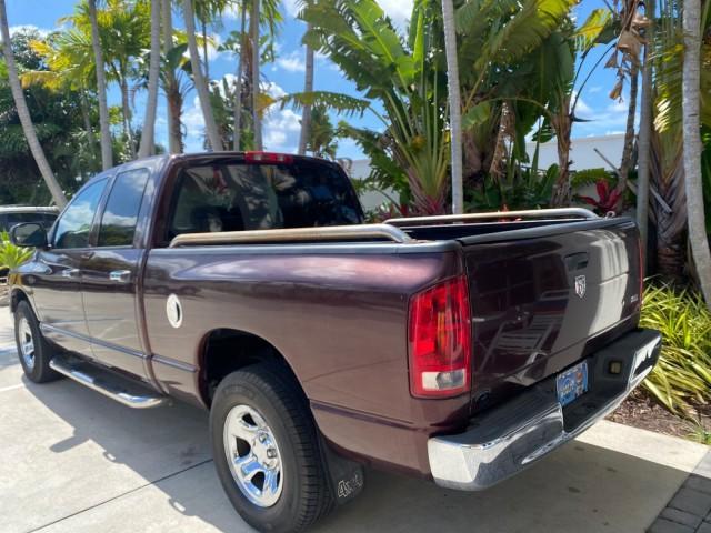 2005 Deep Molten Red Pearl /Dark Slate Gray Dodge Ram 1500 4 DR SLT 1 OWNER FL HEMI 5.7 V8 (1D7HA18D25J) with an 5.7L V8 Hemi Magnum Engine engine, Automatic transmission, located at 4701 North Dixie Hwy, Pompano Beach, FL, 33064, (954) 422-2889, 26.240938, -80.123474 - OUR WEBPAGE FLORIDACARS1.COM HAS OVER 100 PHOTOS AND FREE CARFAX LINK 2005 DODGE RAM 1500 SLT 5.7 V8 HEMI EXTENDED CAB 1 OWNER FLORIDA VIN: 1D7HA18D25J621258 1 D 7 H A 1 8 D 2 5 J 6 2 1 2 5 8 4 DOOR EXTENDED CAB PICKUP 5.7L V8 F GASOLINE 18 MPG REAR WHEEL DRIVE Features ABS Brakes Air Conditioning A - Photo#33