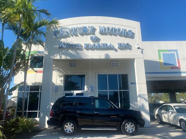 2002 Sable Black /Pewter Cadillac Escalade L0W MILES 68,090 4WD (1GYEK63N92R) with an 6.0L Vortec 1000 SFI V8 HO Engine engine, Automatic transmission, located at 4701 North Dixie Hwy, Pompano Beach, FL, 33064, (954) 422-2889, 26.240938, -80.123474 - OUR WEBPAGE FLORIDACARS1.COM HAS OVER 100 PHOTOS AND FREE CARFAX LINK 2002 CADILLAC ESCALADE 4WD COST 52,230 NEW ALL ORIGINAL BLACK PAINT VIN: 1GYEK63N92R116865 1 G Y E K 6 3 N 9 2 R 1 1 6 8 6 5 4 DOOR WAGON/SPORT UTILITY 6.0L V8 F GASOLINE 17 MPG ALL WHEEL DRIVE Features 4WD/AWD ABS Brakes Air Cond - Photo#0