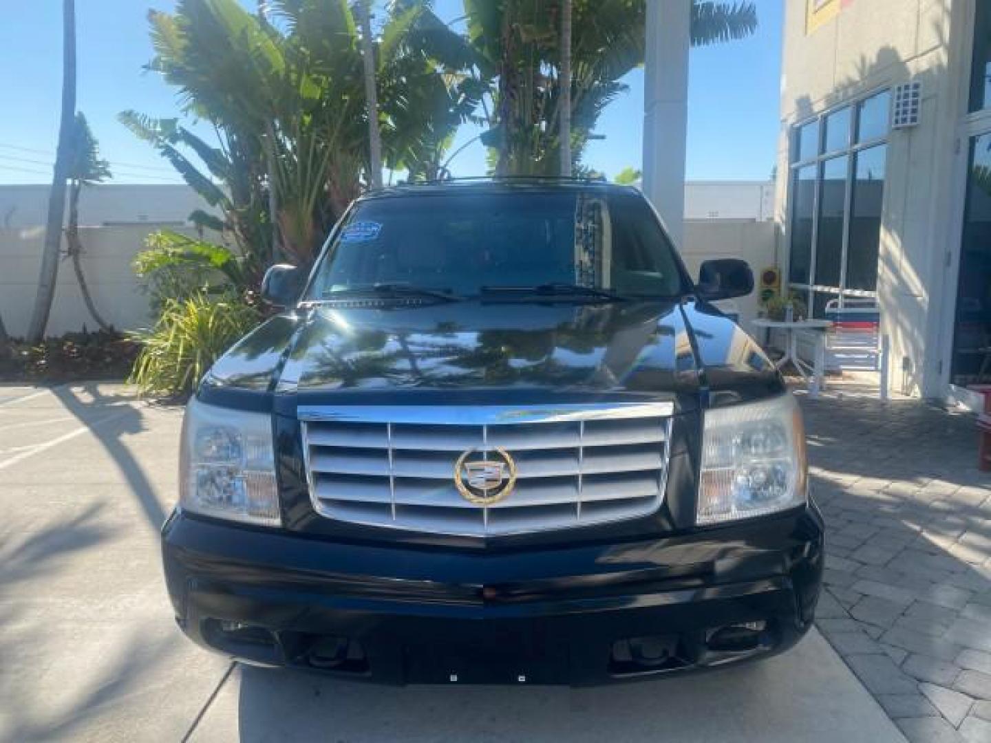 2002 Sable Black /Pewter Cadillac Escalade L0W MILES 68,090 4WD (1GYEK63N92R) with an 6.0L Vortec 1000 SFI V8 HO Engine engine, Automatic transmission, located at 4701 North Dixie Hwy, Pompano Beach, FL, 33064, (954) 422-2889, 26.240938, -80.123474 - OUR WEBPAGE FLORIDACARS1.COM HAS OVER 100 PHOTOS AND FREE CARFAX LINK 2002 CADILLAC ESCALADE 4WD COST 52,230 NEW ALL ORIGINAL BLACK PAINT VIN: 1GYEK63N92R116865 1 G Y E K 6 3 N 9 2 R 1 1 6 8 6 5 4 DOOR WAGON/SPORT UTILITY 6.0L V8 F GASOLINE 17 MPG ALL WHEEL DRIVE Features 4WD/AWD ABS Brakes Air Cond - Photo#2