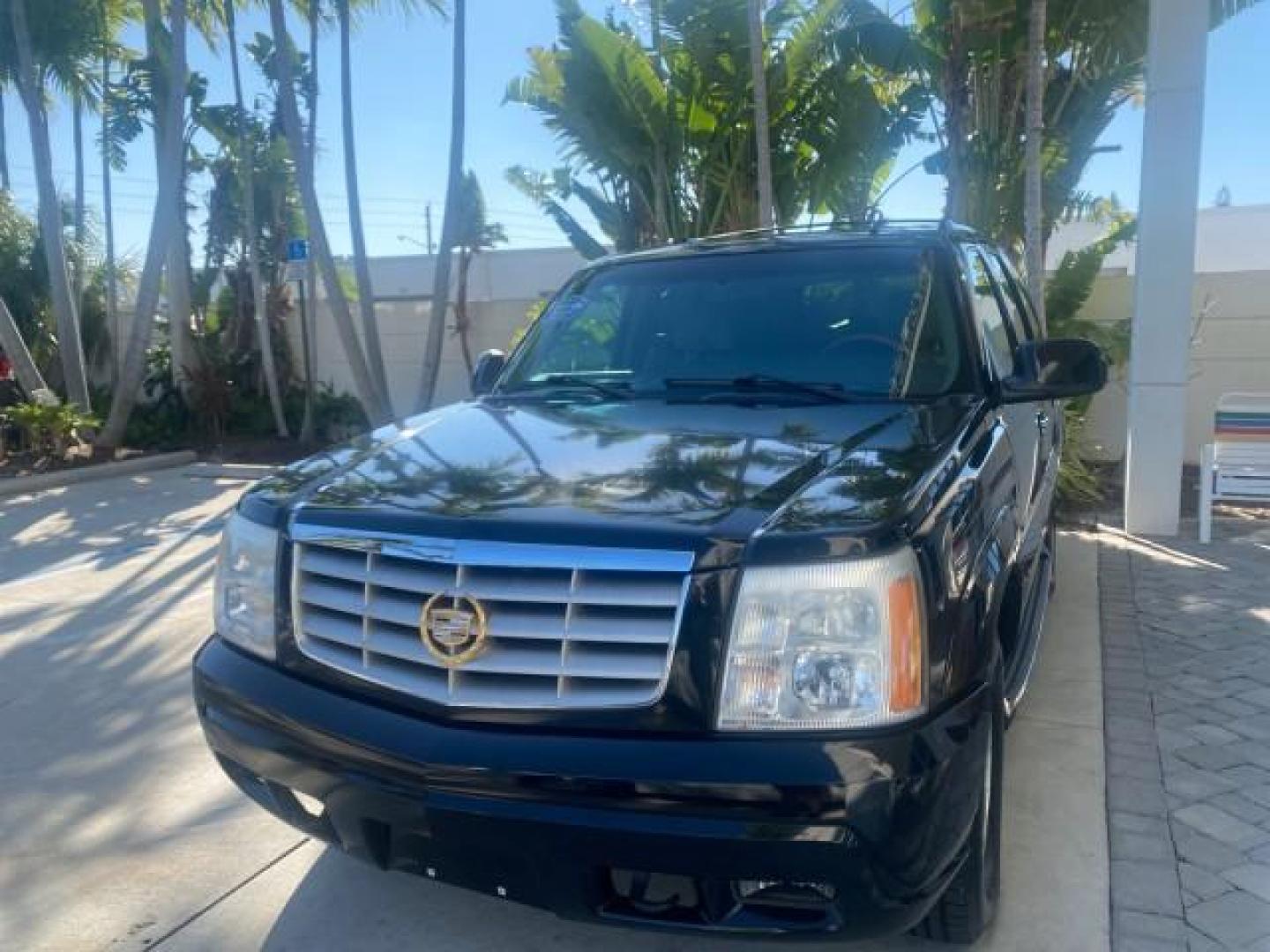 2002 Sable Black /Pewter Cadillac Escalade L0W MILES 68,090 4WD (1GYEK63N92R) with an 6.0L Vortec 1000 SFI V8 HO Engine engine, Automatic transmission, located at 4701 North Dixie Hwy, Pompano Beach, FL, 33064, (954) 422-2889, 26.240938, -80.123474 - OUR WEBPAGE FLORIDACARS1.COM HAS OVER 100 PHOTOS AND FREE CARFAX LINK 2002 CADILLAC ESCALADE 4WD COST 52,230 NEW ALL ORIGINAL BLACK PAINT VIN: 1GYEK63N92R116865 1 G Y E K 6 3 N 9 2 R 1 1 6 8 6 5 4 DOOR WAGON/SPORT UTILITY 6.0L V8 F GASOLINE 17 MPG ALL WHEEL DRIVE Features 4WD/AWD ABS Brakes Air Cond - Photo#3