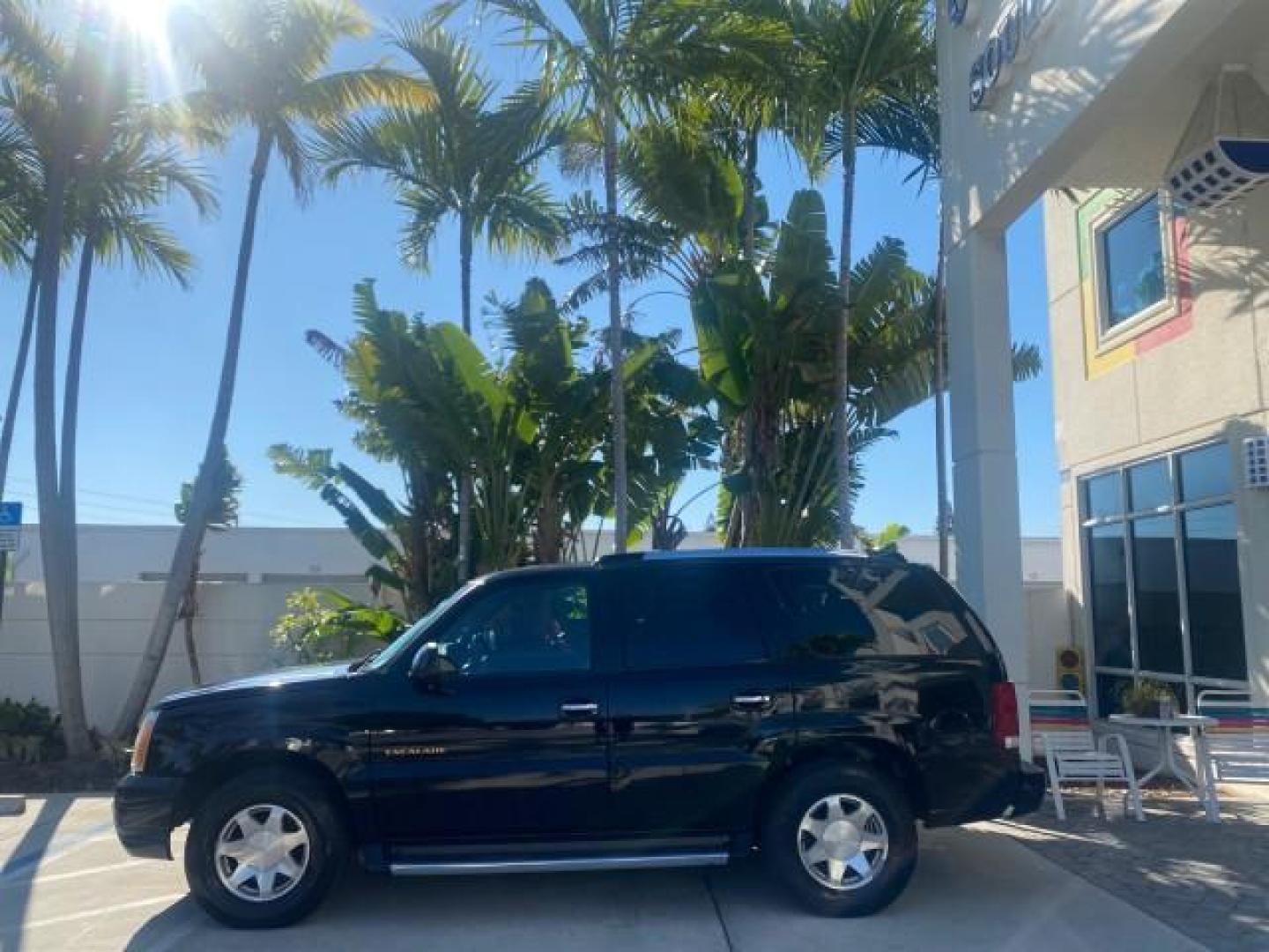 2002 Sable Black /Pewter Cadillac Escalade L0W MILES 68,090 4WD (1GYEK63N92R) with an 6.0L Vortec 1000 SFI V8 HO Engine engine, Automatic transmission, located at 4701 North Dixie Hwy, Pompano Beach, FL, 33064, (954) 422-2889, 26.240938, -80.123474 - OUR WEBPAGE FLORIDACARS1.COM HAS OVER 100 PHOTOS AND FREE CARFAX LINK 2002 CADILLAC ESCALADE 4WD COST 52,230 NEW ALL ORIGINAL BLACK PAINT VIN: 1GYEK63N92R116865 1 G Y E K 6 3 N 9 2 R 1 1 6 8 6 5 4 DOOR WAGON/SPORT UTILITY 6.0L V8 F GASOLINE 17 MPG ALL WHEEL DRIVE Features 4WD/AWD ABS Brakes Air Cond - Photo#4