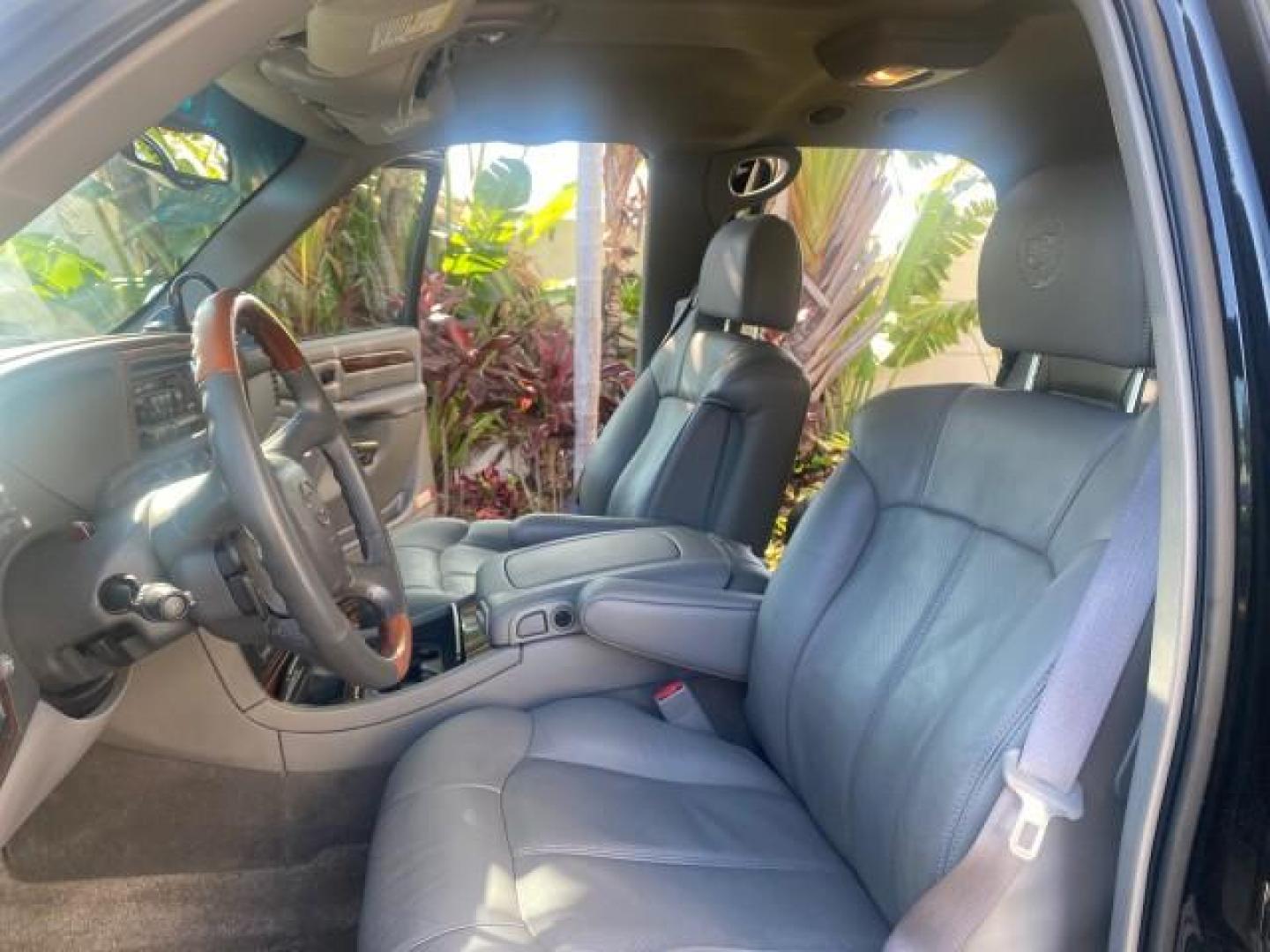 2002 Sable Black /Pewter Cadillac Escalade L0W MILES 68,090 4WD (1GYEK63N92R) with an 6.0L Vortec 1000 SFI V8 HO Engine engine, Automatic transmission, located at 4701 North Dixie Hwy, Pompano Beach, FL, 33064, (954) 422-2889, 26.240938, -80.123474 - OUR WEBPAGE FLORIDACARS1.COM HAS OVER 100 PHOTOS AND FREE CARFAX LINK 2002 CADILLAC ESCALADE 4WD COST 52,230 NEW ALL ORIGINAL BLACK PAINT VIN: 1GYEK63N92R116865 1 G Y E K 6 3 N 9 2 R 1 1 6 8 6 5 4 DOOR WAGON/SPORT UTILITY 6.0L V8 F GASOLINE 17 MPG ALL WHEEL DRIVE Features 4WD/AWD ABS Brakes Air Cond - Photo#10