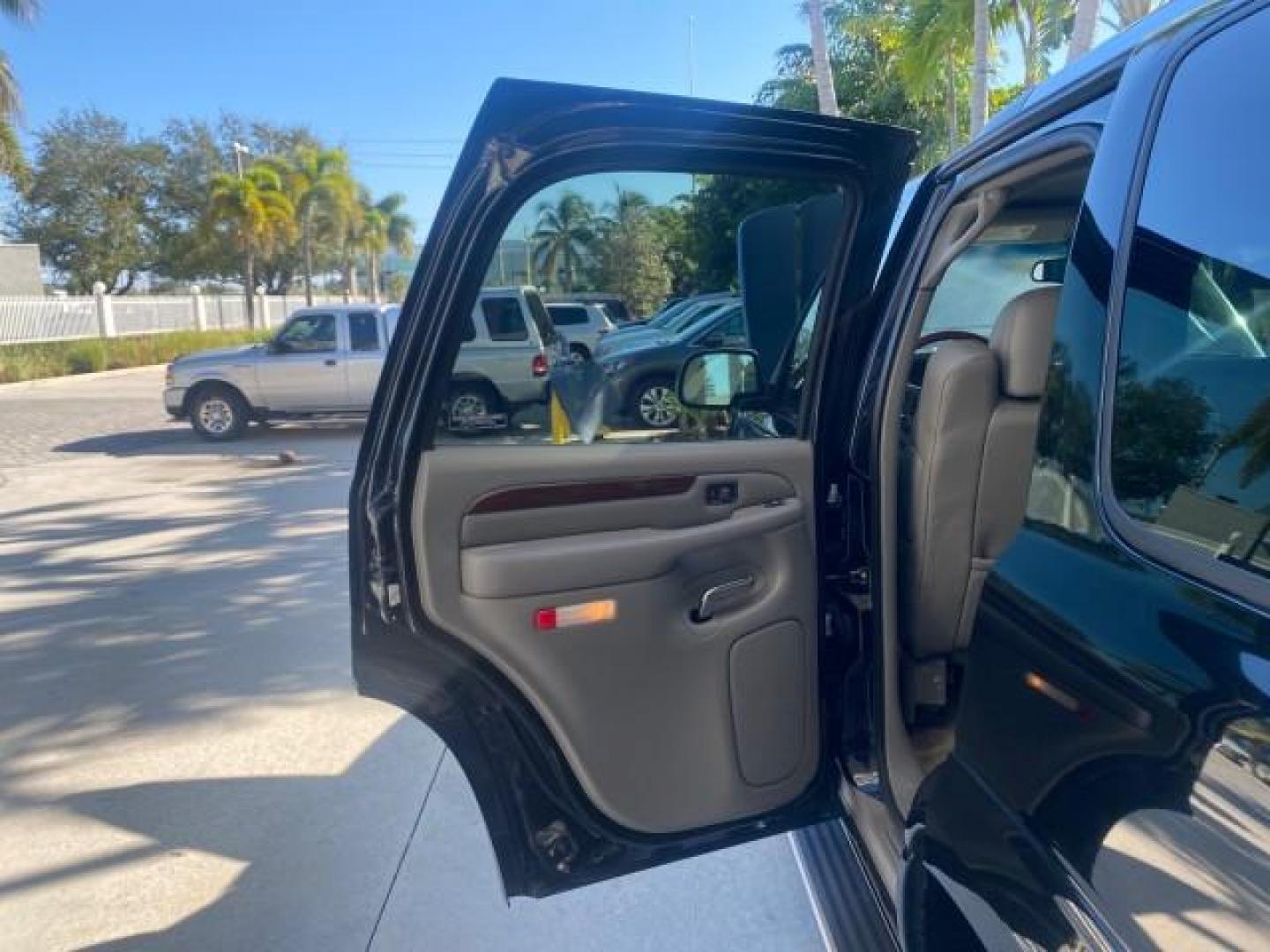 2002 Sable Black /Pewter Cadillac Escalade L0W MILES 68,090 4WD (1GYEK63N92R) with an 6.0L Vortec 1000 SFI V8 HO Engine engine, Automatic transmission, located at 4701 North Dixie Hwy, Pompano Beach, FL, 33064, (954) 422-2889, 26.240938, -80.123474 - OUR WEBPAGE FLORIDACARS1.COM HAS OVER 100 PHOTOS AND FREE CARFAX LINK 2002 CADILLAC ESCALADE 4WD COST 52,230 NEW ALL ORIGINAL BLACK PAINT VIN: 1GYEK63N92R116865 1 G Y E K 6 3 N 9 2 R 1 1 6 8 6 5 4 DOOR WAGON/SPORT UTILITY 6.0L V8 F GASOLINE 17 MPG ALL WHEEL DRIVE Features 4WD/AWD ABS Brakes Air Cond - Photo#13