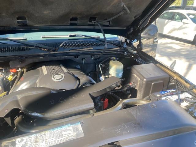 2002 Sable Black /Pewter Cadillac Escalade L0W MILES 68,090 4WD (1GYEK63N92R) with an 6.0L Vortec 1000 SFI V8 HO Engine engine, Automatic transmission, located at 4701 North Dixie Hwy, Pompano Beach, FL, 33064, (954) 422-2889, 26.240938, -80.123474 - OUR WEBPAGE FLORIDACARS1.COM HAS OVER 100 PHOTOS AND FREE CARFAX LINK 2002 CADILLAC ESCALADE 4WD COST 52,230 NEW ALL ORIGINAL BLACK PAINT VIN: 1GYEK63N92R116865 1 G Y E K 6 3 N 9 2 R 1 1 6 8 6 5 4 DOOR WAGON/SPORT UTILITY 6.0L V8 F GASOLINE 17 MPG ALL WHEEL DRIVE Features 4WD/AWD ABS Brakes Air Cond - Photo#25