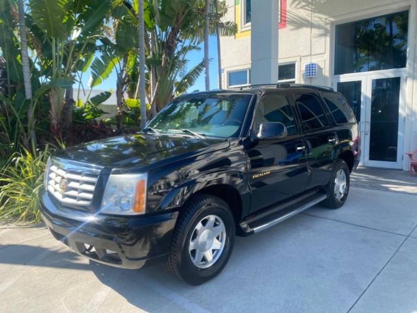 2002 Sable Black /Pewter Cadillac Escalade L0W MILES 68,090 4WD (1GYEK63N92R) with an 6.0L Vortec 1000 SFI V8 HO Engine engine, Automatic transmission, located at 4701 North Dixie Hwy, Pompano Beach, FL, 33064, (954) 422-2889, 26.240938, -80.123474 - OUR WEBPAGE FLORIDACARS1.COM HAS OVER 100 PHOTOS AND FREE CARFAX LINK 2002 CADILLAC ESCALADE 4WD COST 52,230 NEW ALL ORIGINAL BLACK PAINT VIN: 1GYEK63N92R116865 1 G Y E K 6 3 N 9 2 R 1 1 6 8 6 5 4 DOOR WAGON/SPORT UTILITY 6.0L V8 F GASOLINE 17 MPG ALL WHEEL DRIVE Features 4WD/AWD ABS Brakes Air Cond - Photo#29