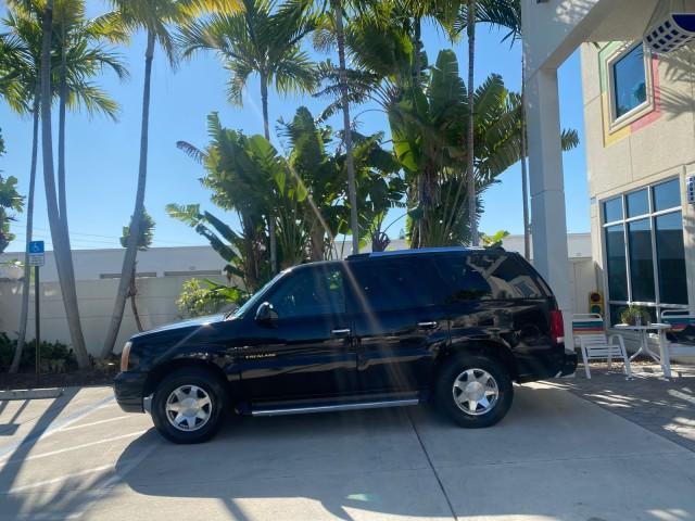 2002 Sable Black /Pewter Cadillac Escalade L0W MILES 68,090 4WD (1GYEK63N92R) with an 6.0L Vortec 1000 SFI V8 HO Engine engine, Automatic transmission, located at 4701 North Dixie Hwy, Pompano Beach, FL, 33064, (954) 422-2889, 26.240938, -80.123474 - OUR WEBPAGE FLORIDACARS1.COM HAS OVER 100 PHOTOS AND FREE CARFAX LINK 2002 CADILLAC ESCALADE 4WD COST 52,230 NEW ALL ORIGINAL BLACK PAINT VIN: 1GYEK63N92R116865 1 G Y E K 6 3 N 9 2 R 1 1 6 8 6 5 4 DOOR WAGON/SPORT UTILITY 6.0L V8 F GASOLINE 17 MPG ALL WHEEL DRIVE Features 4WD/AWD ABS Brakes Air Cond - Photo#30