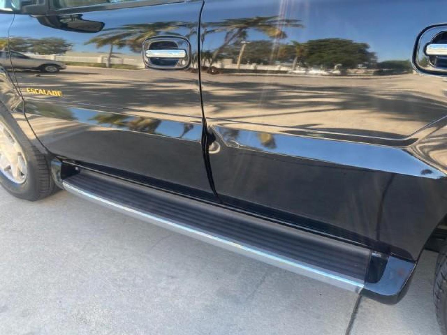 2002 Sable Black /Pewter Cadillac Escalade L0W MILES 68,090 4WD (1GYEK63N92R) with an 6.0L Vortec 1000 SFI V8 HO Engine engine, Automatic transmission, located at 4701 North Dixie Hwy, Pompano Beach, FL, 33064, (954) 422-2889, 26.240938, -80.123474 - OUR WEBPAGE FLORIDACARS1.COM HAS OVER 100 PHOTOS AND FREE CARFAX LINK 2002 CADILLAC ESCALADE 4WD COST 52,230 NEW ALL ORIGINAL BLACK PAINT VIN: 1GYEK63N92R116865 1 G Y E K 6 3 N 9 2 R 1 1 6 8 6 5 4 DOOR WAGON/SPORT UTILITY 6.0L V8 F GASOLINE 17 MPG ALL WHEEL DRIVE Features 4WD/AWD ABS Brakes Air Cond - Photo#40