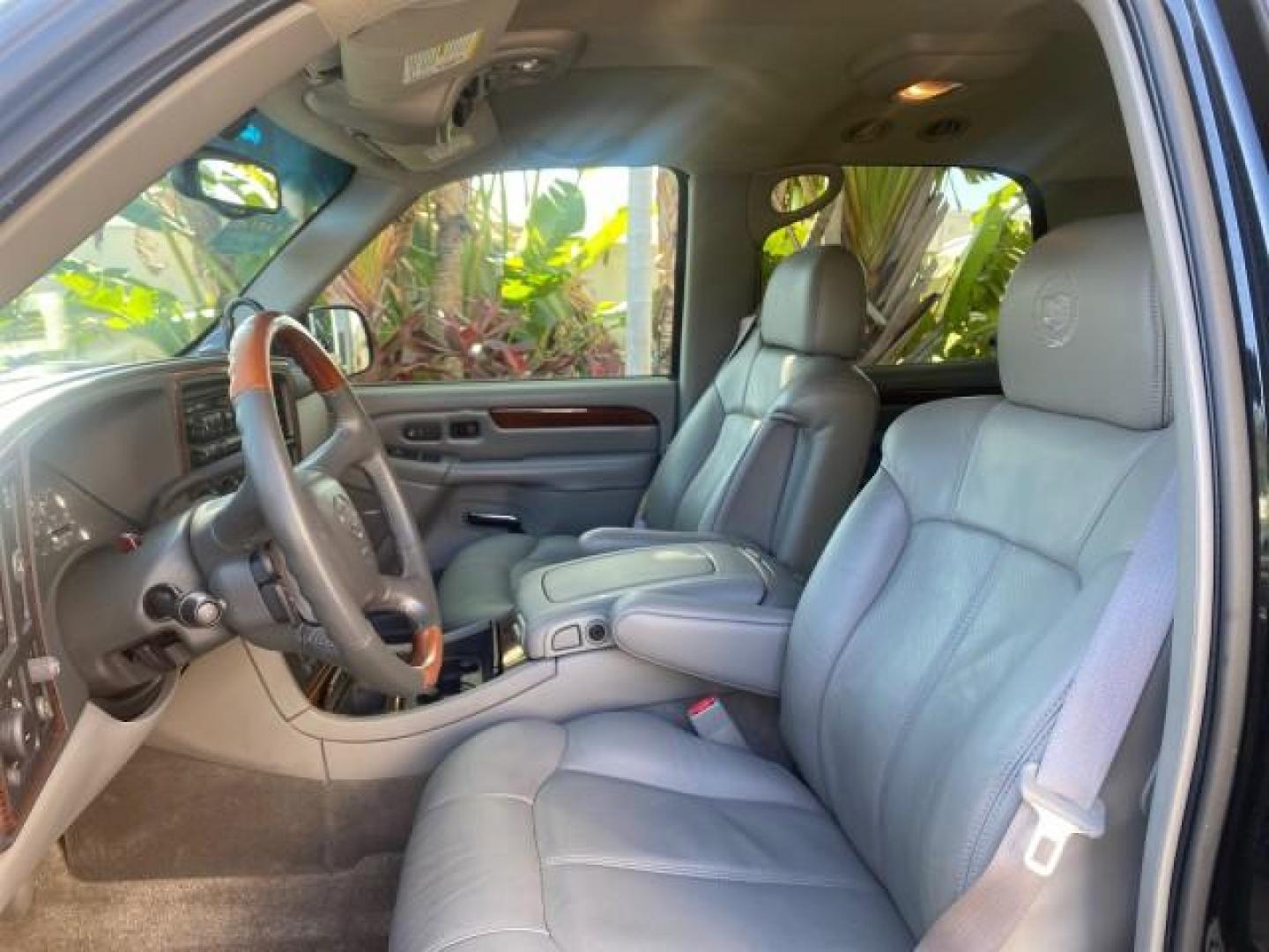 2002 Sable Black /Pewter Cadillac Escalade L0W MILES 68,090 4WD (1GYEK63N92R) with an 6.0L Vortec 1000 SFI V8 HO Engine engine, Automatic transmission, located at 4701 North Dixie Hwy, Pompano Beach, FL, 33064, (954) 422-2889, 26.240938, -80.123474 - OUR WEBPAGE FLORIDACARS1.COM HAS OVER 100 PHOTOS AND FREE CARFAX LINK 2002 CADILLAC ESCALADE 4WD COST 52,230 NEW ALL ORIGINAL BLACK PAINT VIN: 1GYEK63N92R116865 1 G Y E K 6 3 N 9 2 R 1 1 6 8 6 5 4 DOOR WAGON/SPORT UTILITY 6.0L V8 F GASOLINE 17 MPG ALL WHEEL DRIVE Features 4WD/AWD ABS Brakes Air Cond - Photo#42