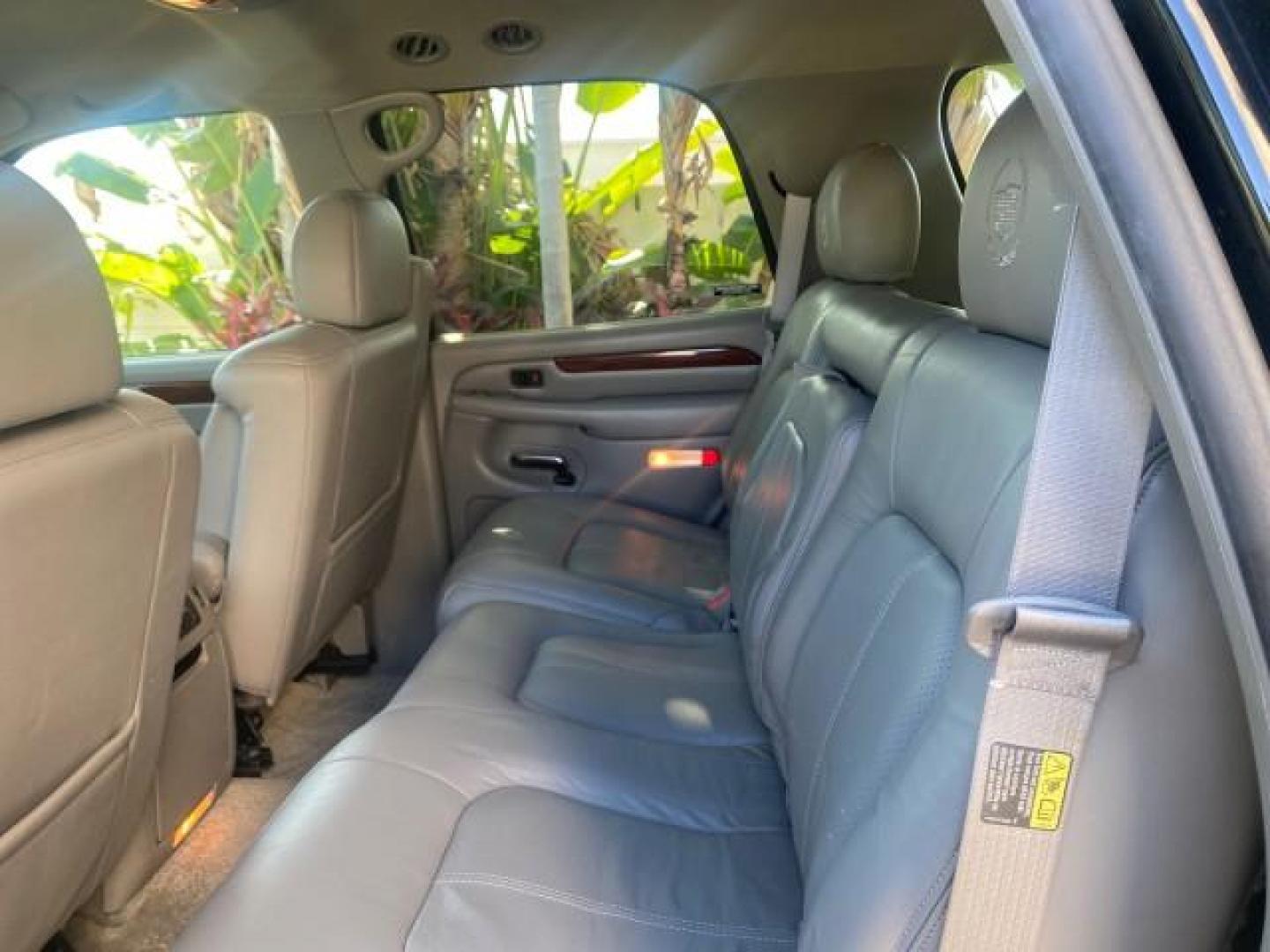 2002 Sable Black /Pewter Cadillac Escalade L0W MILES 68,090 4WD (1GYEK63N92R) with an 6.0L Vortec 1000 SFI V8 HO Engine engine, Automatic transmission, located at 4701 North Dixie Hwy, Pompano Beach, FL, 33064, (954) 422-2889, 26.240938, -80.123474 - OUR WEBPAGE FLORIDACARS1.COM HAS OVER 100 PHOTOS AND FREE CARFAX LINK 2002 CADILLAC ESCALADE 4WD COST 52,230 NEW ALL ORIGINAL BLACK PAINT VIN: 1GYEK63N92R116865 1 G Y E K 6 3 N 9 2 R 1 1 6 8 6 5 4 DOOR WAGON/SPORT UTILITY 6.0L V8 F GASOLINE 17 MPG ALL WHEEL DRIVE Features 4WD/AWD ABS Brakes Air Cond - Photo#73