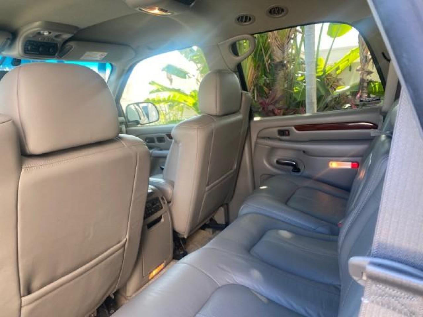 2002 Sable Black /Pewter Cadillac Escalade L0W MILES 68,090 4WD (1GYEK63N92R) with an 6.0L Vortec 1000 SFI V8 HO Engine engine, Automatic transmission, located at 4701 North Dixie Hwy, Pompano Beach, FL, 33064, (954) 422-2889, 26.240938, -80.123474 - OUR WEBPAGE FLORIDACARS1.COM HAS OVER 100 PHOTOS AND FREE CARFAX LINK 2002 CADILLAC ESCALADE 4WD COST 52,230 NEW ALL ORIGINAL BLACK PAINT VIN: 1GYEK63N92R116865 1 G Y E K 6 3 N 9 2 R 1 1 6 8 6 5 4 DOOR WAGON/SPORT UTILITY 6.0L V8 F GASOLINE 17 MPG ALL WHEEL DRIVE Features 4WD/AWD ABS Brakes Air Cond - Photo#75