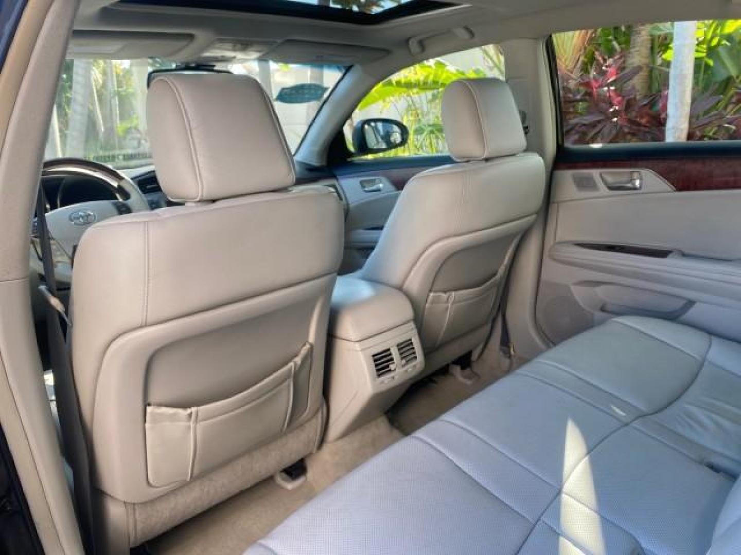 2011 Black /Light Gray Toyota Avalon Limited LOW MILES 80,879 (4T1BK3DB4BU) with an 3.5L DOHC EFI 24-Valve V6 Engine engine, Automatic transmission, located at 4701 North Dixie Hwy, Pompano Beach, FL, 33064, (954) 422-2889, 26.240938, -80.123474 - OUR WEBPAGE FLORIDACARS1.COM HAS OVER 100 PHOTOS AND FREE CARFAX LINK 2011 TOYOTA AVALON LIMITED NAVIGATION SUNROOF LOADED DASH HAS NO CRACKS VIN: 4T1BK3DB4BU438544 4 T 1 B K 3 D B 4 B U 4 3 8 5 4 4 SEDAN 4 DR 3.5L V6 F DOHC 24V GASOLINE 29 MPG FRONT WHEEL DRIVE Features A/C Seat(s) ABS Brakes Air C - Photo#82