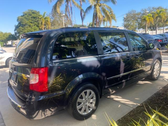 2014 True Blue Pearlcoat /Black/Light Graystone Chrysler Town and Country Touring LOW MILES 64,377 1 OWNER FL (2C4RC1BG3ER) with an 3.6L V6 Cylinder Engine engine, Automatic transmission, located at 4701 North Dixie Hwy, Pompano Beach, FL, 33064, (954) 422-2889, 26.240938, -80.123474 - OUR WEBPAGE FLORIDACARS1.COM HAS OVER 100 PHOTOS AND FREE CARFAX LINK 2014 CHRYSLER TOWN AND COUNTRY TOURING VIN: 2C4RC1BG3ER148946 2 C 4 R C 1 B G 3 E R 1 4 8 9 4 6 VAN 3.6L V6 F DOHC 24V GASOLINE 25 MPG FRONT WHEEL DRIVE Features ABS Brakes Air Conditioning Alloy Wheels AM/FM Stereo Automatic Tran - Photo#7