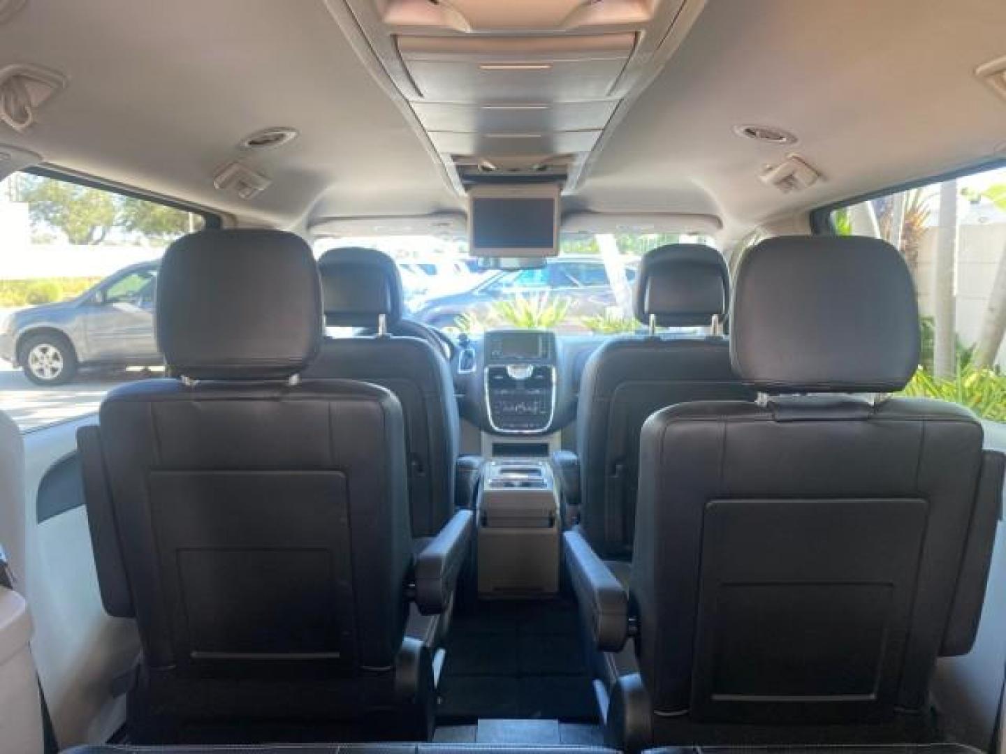 2014 True Blue Pearlcoat /Black/Light Graystone Chrysler Town and Country Touring LOW MILES 64,377 1 OWNER FL (2C4RC1BG3ER) with an 3.6L V6 Cylinder Engine engine, Automatic transmission, located at 4701 North Dixie Hwy, Pompano Beach, FL, 33064, (954) 422-2889, 26.240938, -80.123474 - OUR WEBPAGE FLORIDACARS1.COM HAS OVER 100 PHOTOS AND FREE CARFAX LINK 2014 CHRYSLER TOWN AND COUNTRY TOURING VIN: 2C4RC1BG3ER148946 2 C 4 R C 1 B G 3 E R 1 4 8 9 4 6 VAN 3.6L V6 F DOHC 24V GASOLINE 25 MPG FRONT WHEEL DRIVE Features ABS Brakes Air Conditioning Alloy Wheels AM/FM Stereo Automatic Tran - Photo#95
