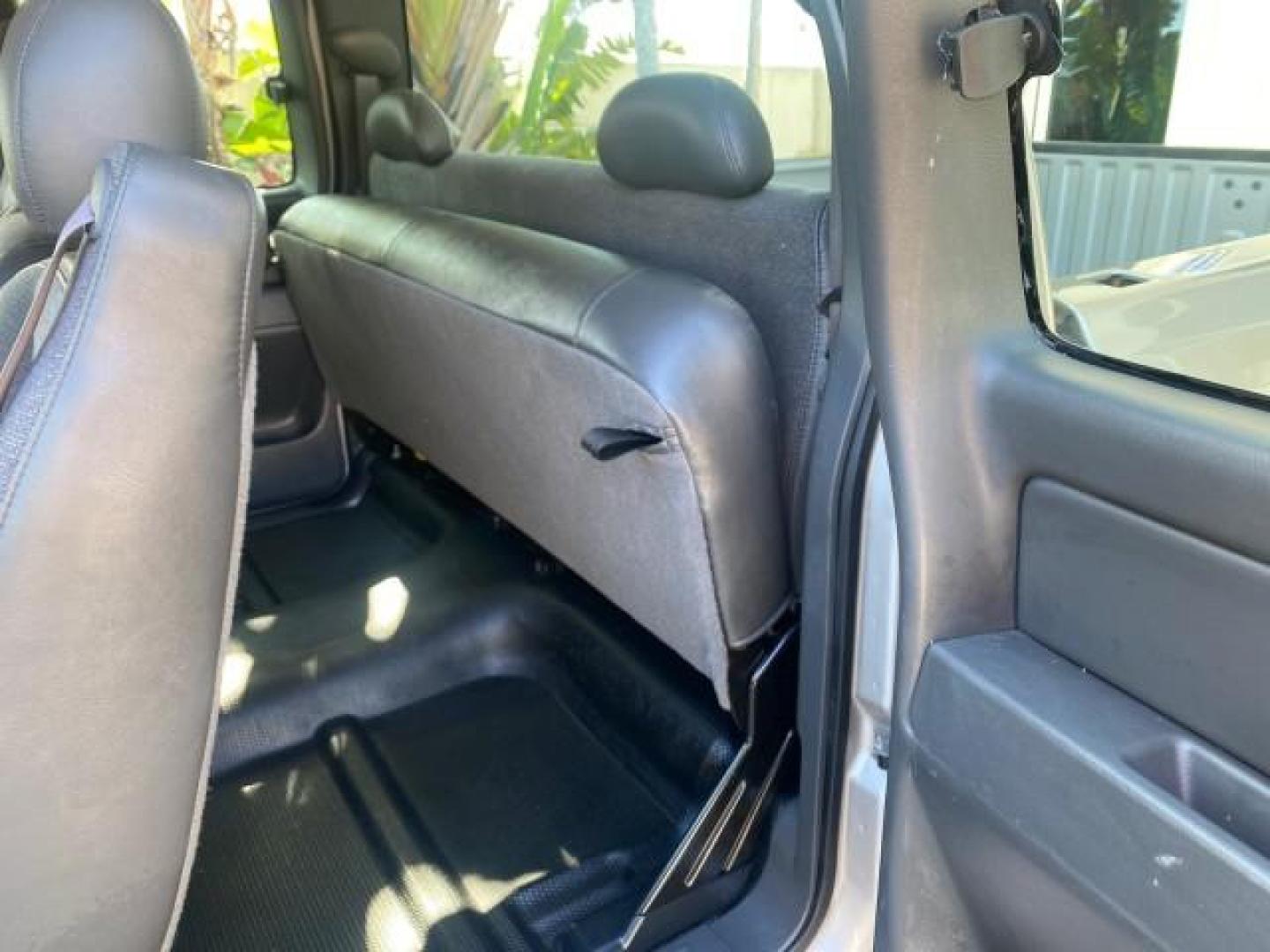 2005 Sandstone Metallic /Medium Gray Chevrolet Silverado 1500 1 OWNER FLORIDA LOW MILES (1GCEC19X85Z) with an 4.3L Vortec 4300 V6 MFI Engine engine, Automatic transmission, located at 4701 North Dixie Hwy, Pompano Beach, FL, 33064, (954) 422-2889, 26.240938, -80.123474 - OUR WEBPAGE FLORIDACARS1.COM HAS OVER 100 PHOTOS AND FREE CARFAX LINK 2005 CHEVROLET SILVERADO 1500 WORK TRUCK 1 OWNER VIN: 1GCEC19X85Z262080 1 G C E C 1 9 X 8 5 Z 2 6 2 0 8 0 4 DOOR EXTENDED CAB PICKUP 4.3L V6 F GASOLINE 21 MPG REAR WHEEL DRIVE Features ABS Brakes Air Conditioning AM/FM Stereo Auto - Photo#58