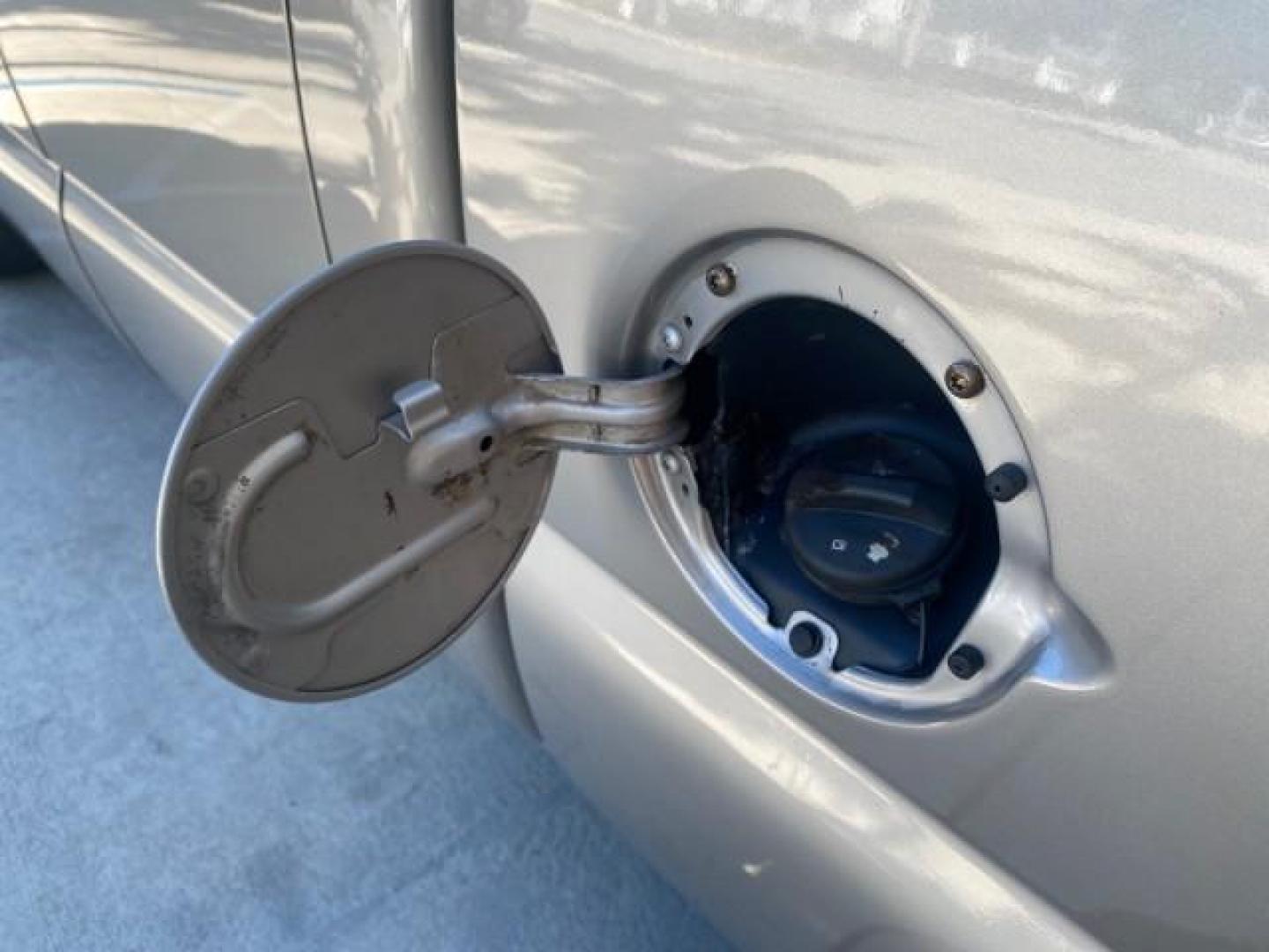 2005 Sandstone Metallic /Medium Gray Chevrolet Silverado 1500 1 OWNER FLORIDA LOW MILES (1GCEC19X85Z) with an 4.3L Vortec 4300 V6 MFI Engine engine, Automatic transmission, located at 4701 North Dixie Hwy, Pompano Beach, FL, 33064, (954) 422-2889, 26.240938, -80.123474 - OUR WEBPAGE FLORIDACARS1.COM HAS OVER 100 PHOTOS AND FREE CARFAX LINK 2005 CHEVROLET SILVERADO 1500 WORK TRUCK 1 OWNER VIN: 1GCEC19X85Z262080 1 G C E C 1 9 X 8 5 Z 2 6 2 0 8 0 4 DOOR EXTENDED CAB PICKUP 4.3L V6 F GASOLINE 21 MPG REAR WHEEL DRIVE Features ABS Brakes Air Conditioning AM/FM Stereo Auto - Photo#71