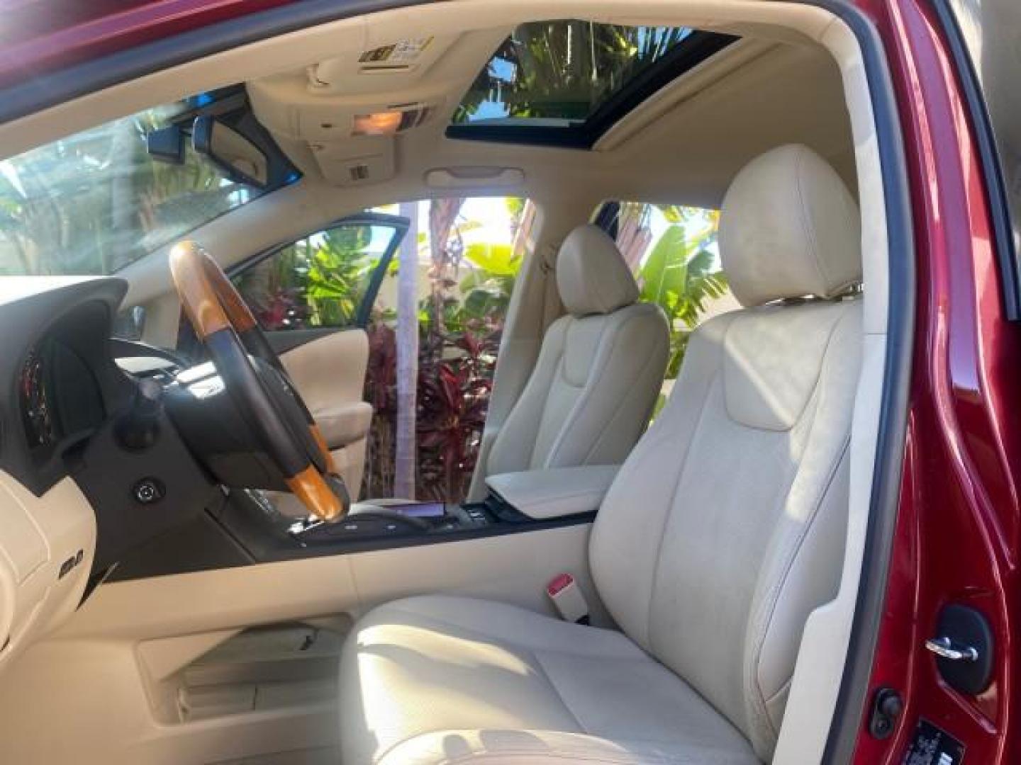 2012 Matador Red Mica /Parchment Lexus RX 350 LOW MILES 68,785 1 OWNER NAV SUV (2T2ZK1BA6CC) with an 3.5L DOHC SFI 24-Valve V6 Engine engine, Automatic transmission, located at 4701 North Dixie Hwy, Pompano Beach, FL, 33064, (954) 422-2889, 26.240938, -80.123474 - OUR WEBPAGE FLORIDACARS1.COM HAS OVER 100 PHOTOS AND FREE CARFAX LINK 2012 LEXUS RX 350 1 OWNER SUNROOF NAVIGATION LOADED VIN: 2T2ZK1BA6CC065213 2 T 2 Z K 1 B A 6 C C 0 6 5 2 1 3 4 DOOR WAGON/SPORT UTILITY 3.5L V6 F DOHC 24V GASOLINE 25 MPG FRONT WHEEL DRIVE Features A/C Seat(s) ABS Brakes Air Condi - Photo#10