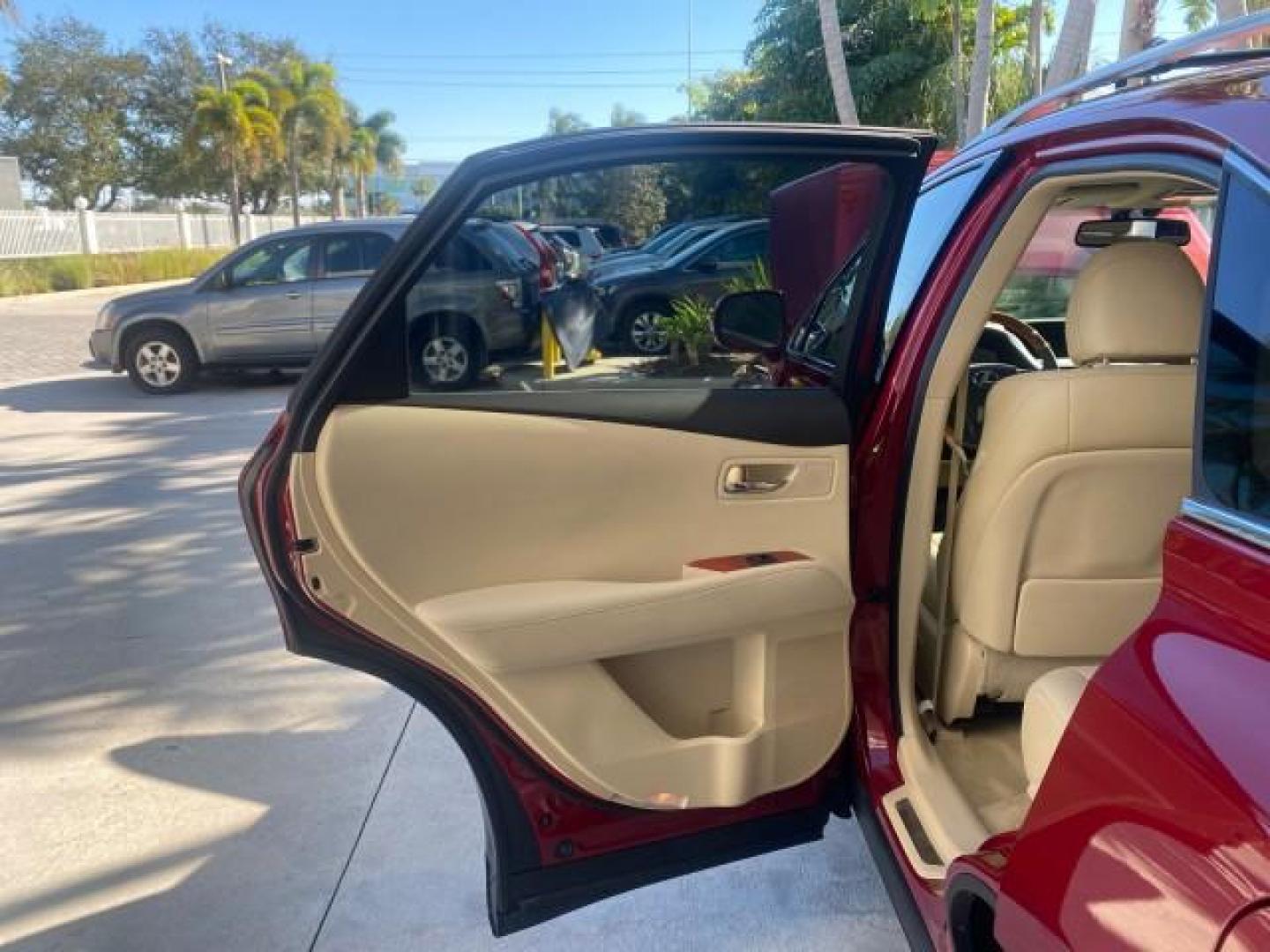 2012 Matador Red Mica /Parchment Lexus RX 350 LOW MILES 68,785 1 OWNER NAV SUV (2T2ZK1BA6CC) with an 3.5L DOHC SFI 24-Valve V6 Engine engine, Automatic transmission, located at 4701 North Dixie Hwy, Pompano Beach, FL, 33064, (954) 422-2889, 26.240938, -80.123474 - OUR WEBPAGE FLORIDACARS1.COM HAS OVER 100 PHOTOS AND FREE CARFAX LINK 2012 LEXUS RX 350 1 OWNER SUNROOF NAVIGATION LOADED VIN: 2T2ZK1BA6CC065213 2 T 2 Z K 1 B A 6 C C 0 6 5 2 1 3 4 DOOR WAGON/SPORT UTILITY 3.5L V6 F DOHC 24V GASOLINE 25 MPG FRONT WHEEL DRIVE Features A/C Seat(s) ABS Brakes Air Condi - Photo#13