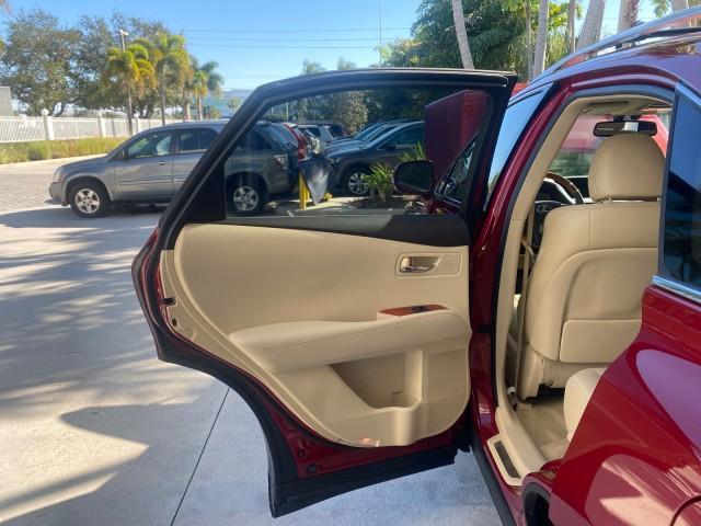 2012 Matador Red Mica /Parchment Lexus RX 350 LOW MILES 68,785 1 OWNER NAV (2T2ZK1BA6CC) with an 3.5L DOHC SFI 24-Valve V6 Engine engine, Automatic transmission, located at 4701 North Dixie Hwy, Pompano Beach, FL, 33064, (954) 422-2889, 26.240938, -80.123474 - OUR WEBPAGE FLORIDACARS1.COM HAS OVER 100 PHOTOS AND FREE CARFAX LINK 2012 LEXUS RX 350 1 OWNER SUNROOF NAVIGATION LOADED VIN: 2T2ZK1BA6CC065213 2 T 2 Z K 1 B A 6 C C 0 6 5 2 1 3 4 DOOR WAGON/SPORT UTILITY 3.5L V6 F DOHC 24V GASOLINE 25 MPG FRONT WHEEL DRIVE Features A/C Seat(s) ABS Brakes Air Condi - Photo#13