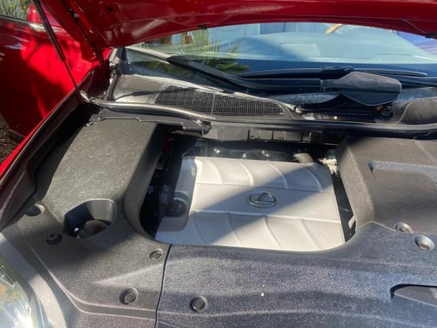 2012 Matador Red Mica /Parchment Lexus RX 350 LOW MILES 68,785 1 OWNER NAV SUV (2T2ZK1BA6CC) with an 3.5L DOHC SFI 24-Valve V6 Engine engine, Automatic transmission, located at 4701 North Dixie Hwy, Pompano Beach, FL, 33064, (954) 422-2889, 26.240938, -80.123474 - OUR WEBPAGE FLORIDACARS1.COM HAS OVER 100 PHOTOS AND FREE CARFAX LINK 2012 LEXUS RX 350 1 OWNER SUNROOF NAVIGATION LOADED VIN: 2T2ZK1BA6CC065213 2 T 2 Z K 1 B A 6 C C 0 6 5 2 1 3 4 DOOR WAGON/SPORT UTILITY 3.5L V6 F DOHC 24V GASOLINE 25 MPG FRONT WHEEL DRIVE Features A/C Seat(s) ABS Brakes Air Condi - Photo#24
