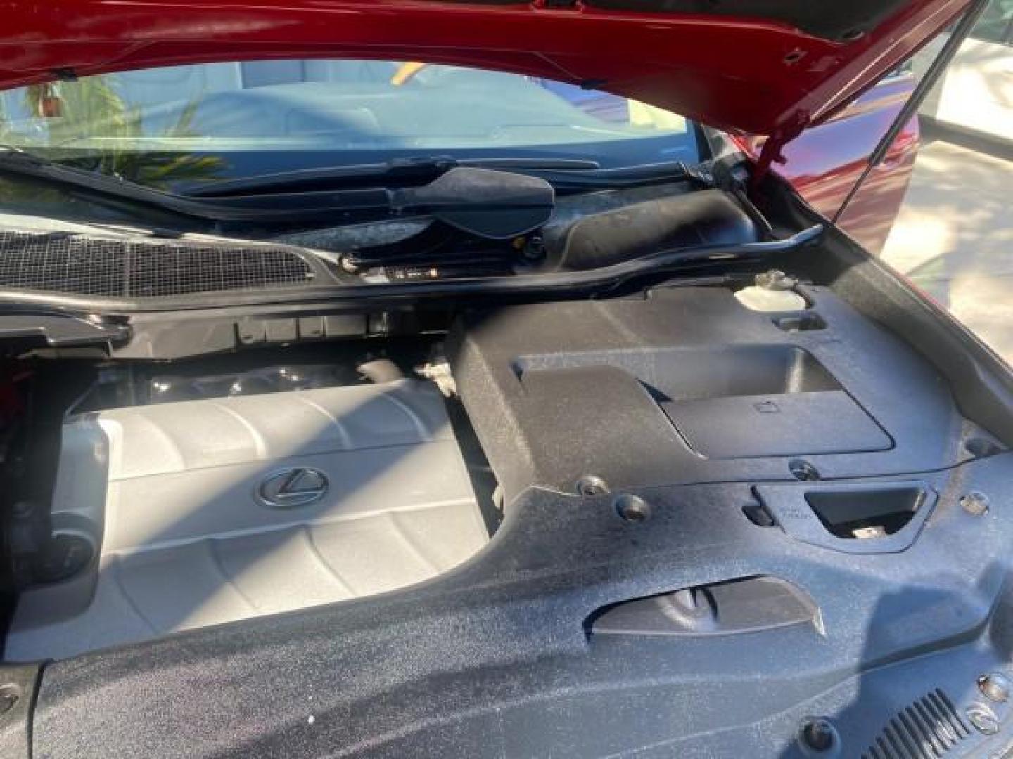 2012 Matador Red Mica /Parchment Lexus RX 350 LOW MILES 68,785 1 OWNER NAV SUV (2T2ZK1BA6CC) with an 3.5L DOHC SFI 24-Valve V6 Engine engine, Automatic transmission, located at 4701 North Dixie Hwy, Pompano Beach, FL, 33064, (954) 422-2889, 26.240938, -80.123474 - OUR WEBPAGE FLORIDACARS1.COM HAS OVER 100 PHOTOS AND FREE CARFAX LINK 2012 LEXUS RX 350 1 OWNER SUNROOF NAVIGATION LOADED VIN: 2T2ZK1BA6CC065213 2 T 2 Z K 1 B A 6 C C 0 6 5 2 1 3 4 DOOR WAGON/SPORT UTILITY 3.5L V6 F DOHC 24V GASOLINE 25 MPG FRONT WHEEL DRIVE Features A/C Seat(s) ABS Brakes Air Condi - Photo#25